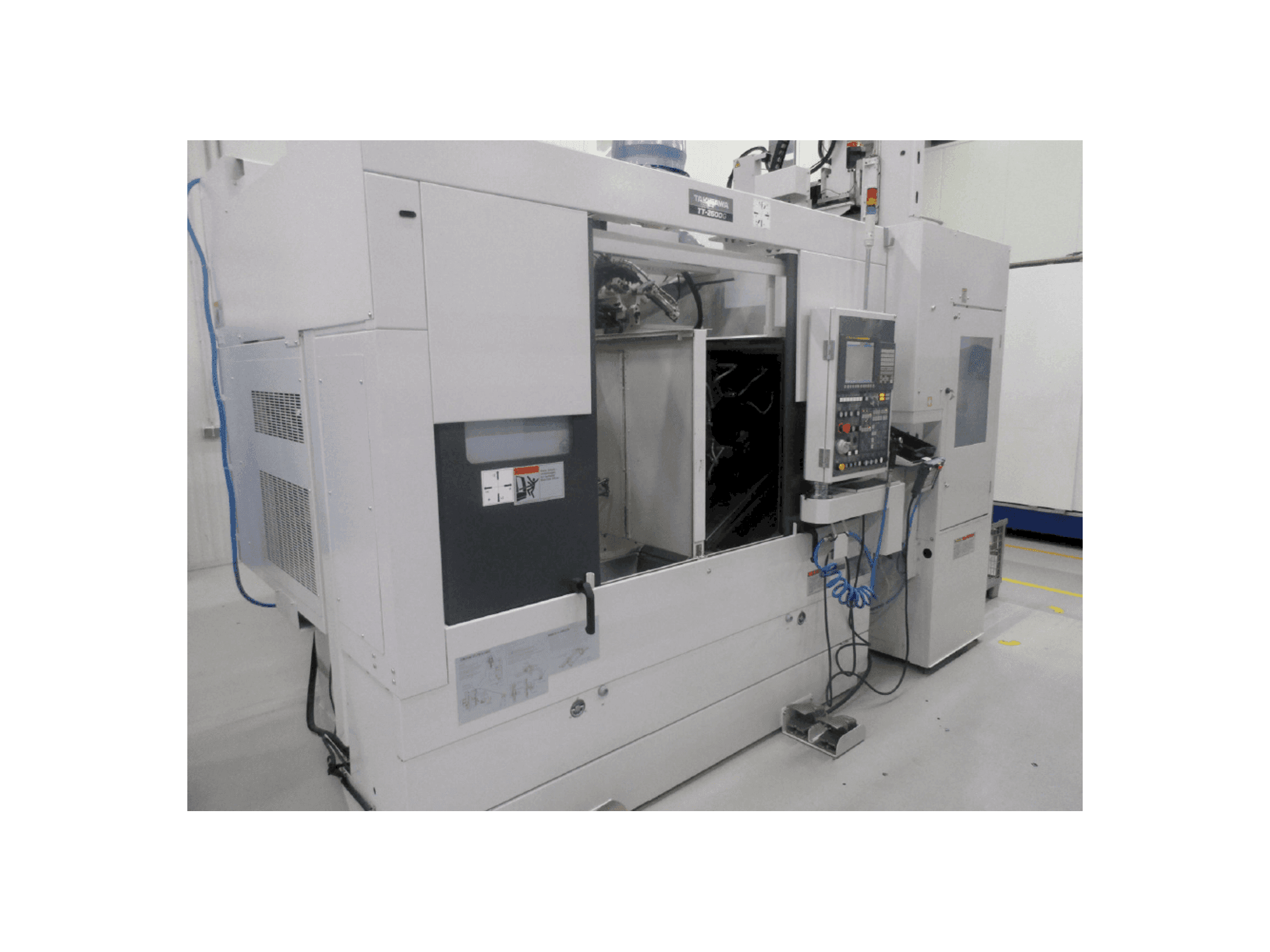 Front view of Takisawa TT-2600G machine