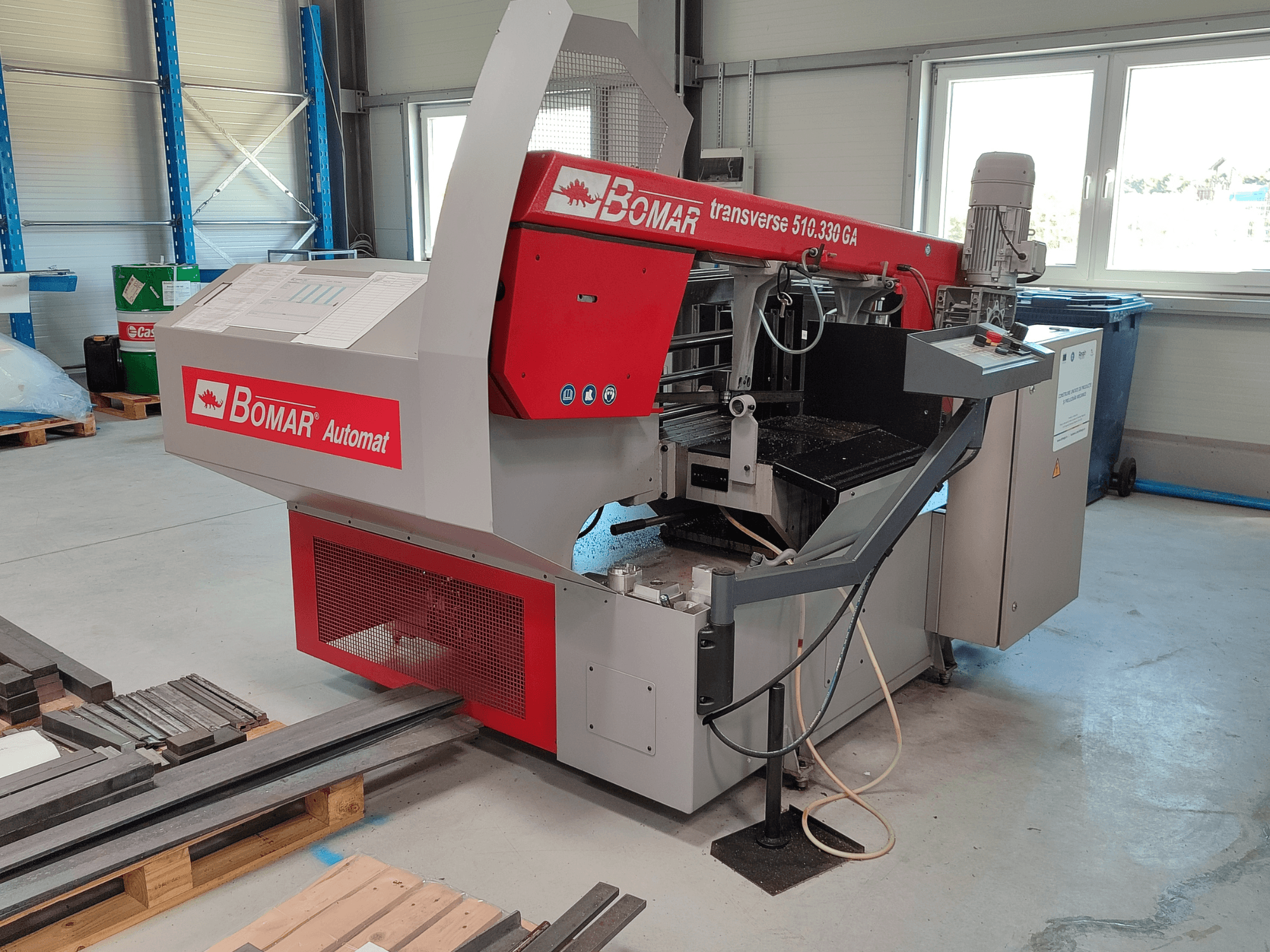 BOMAR Automat transverse 510.330 GA, side view of metal cutting machine with control panel and sawdust collector.