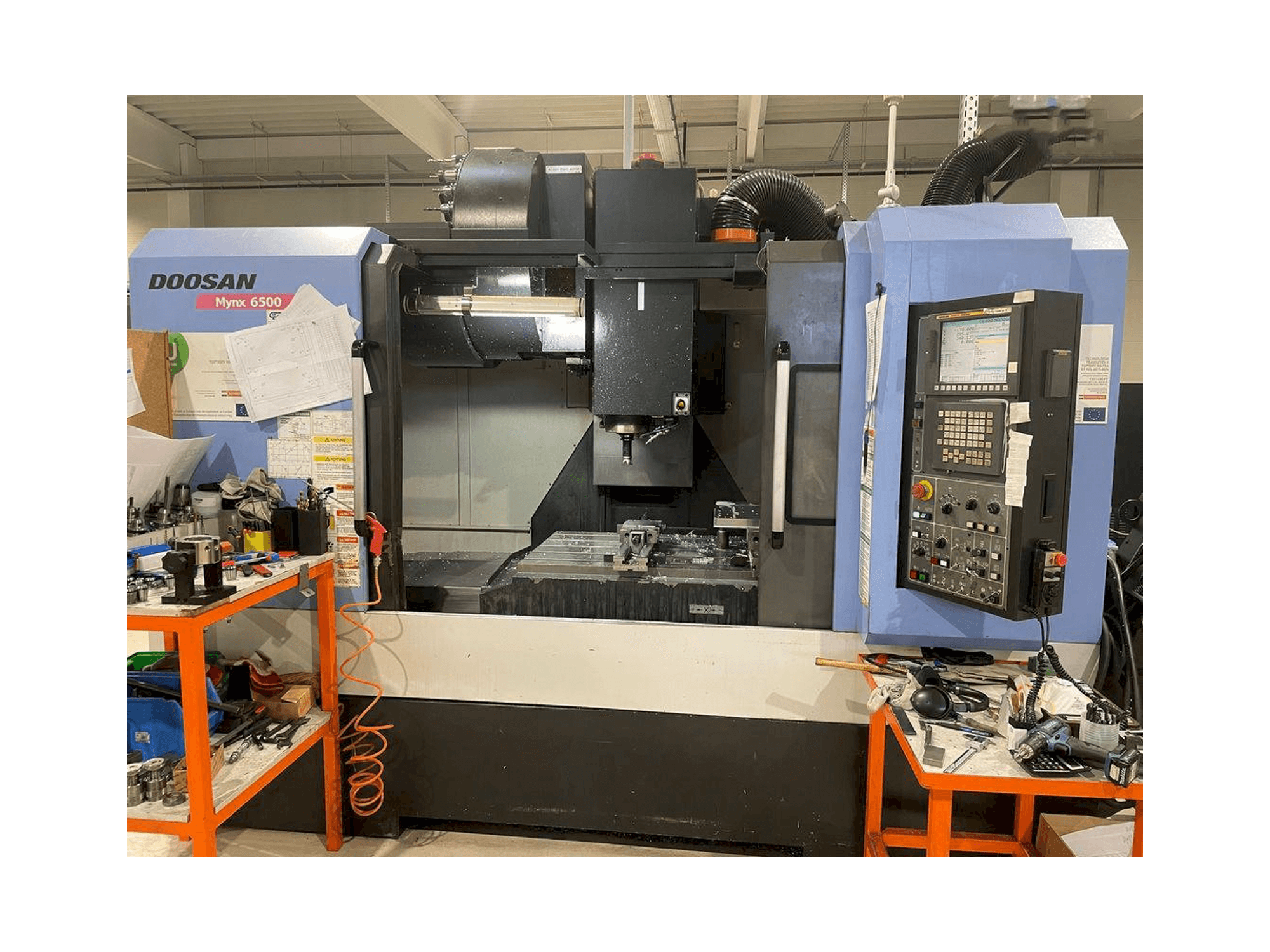 Front view of Doosan MYNX DNM 6500 machine
