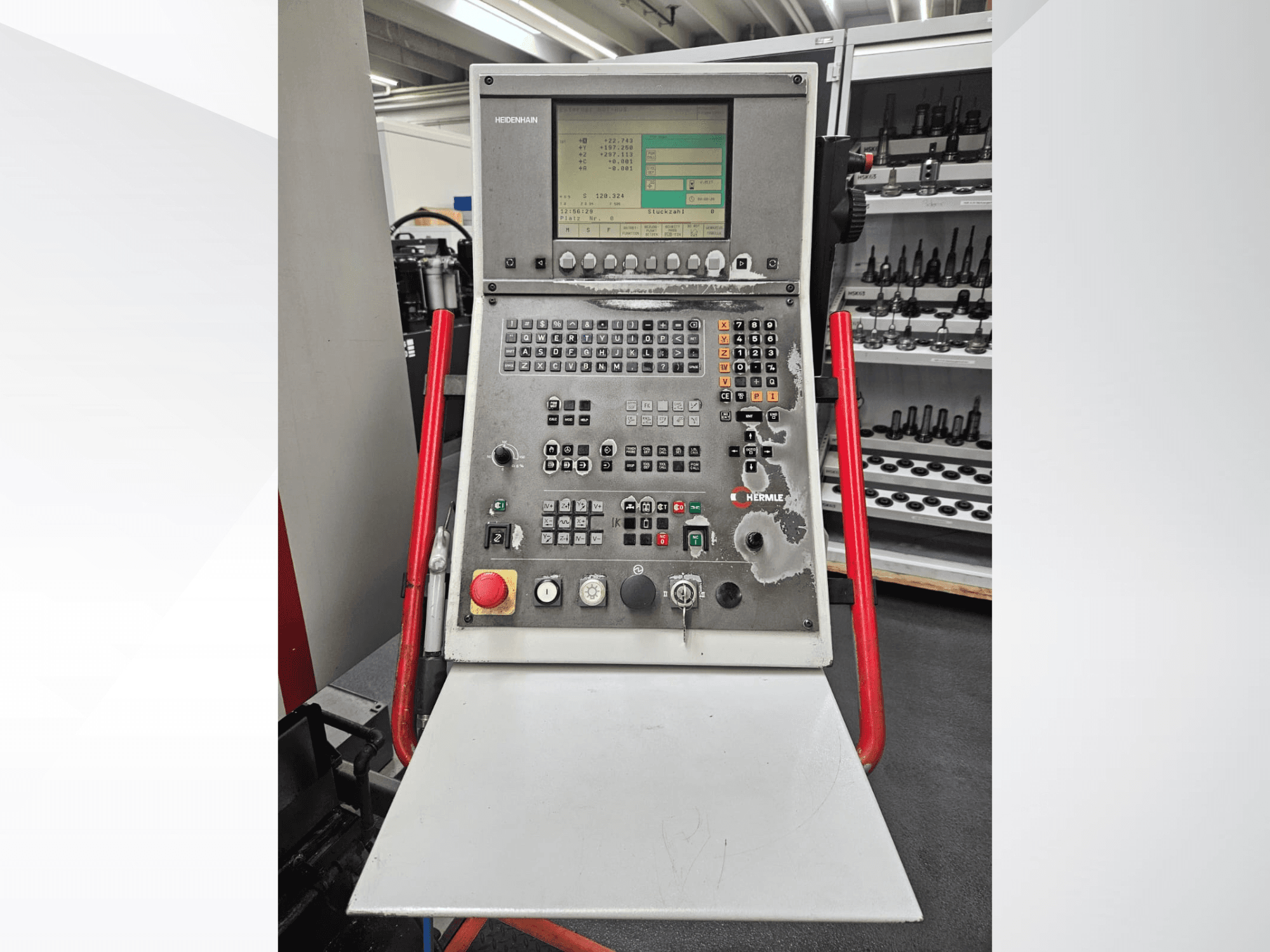 Control panel of HERMLE C 600 U Universal Machining Centre, front view with buttons and display screen visible.