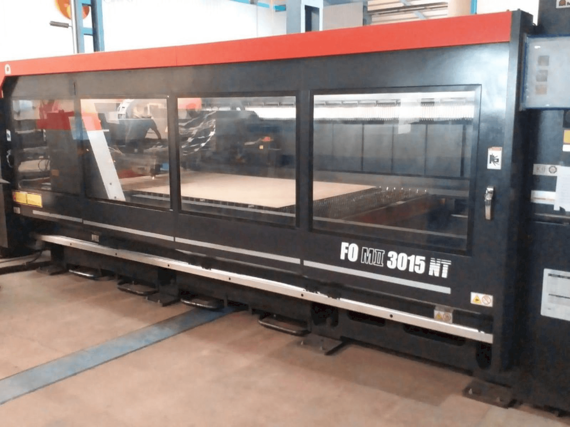 Front view of AMADA F0M2 3015 MT machine