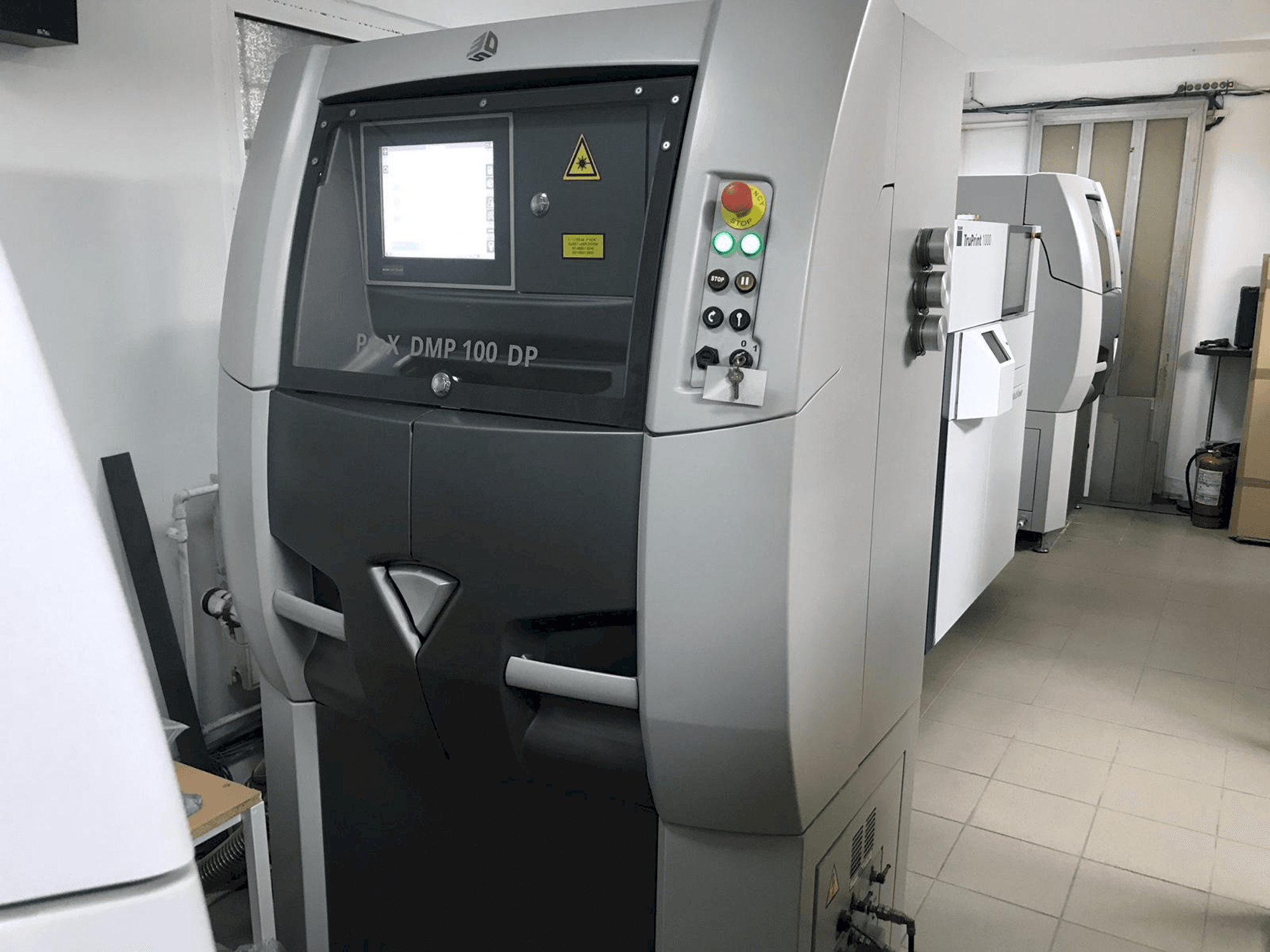 Front view of 3D SYSTEMS ProX DMP 100 machine