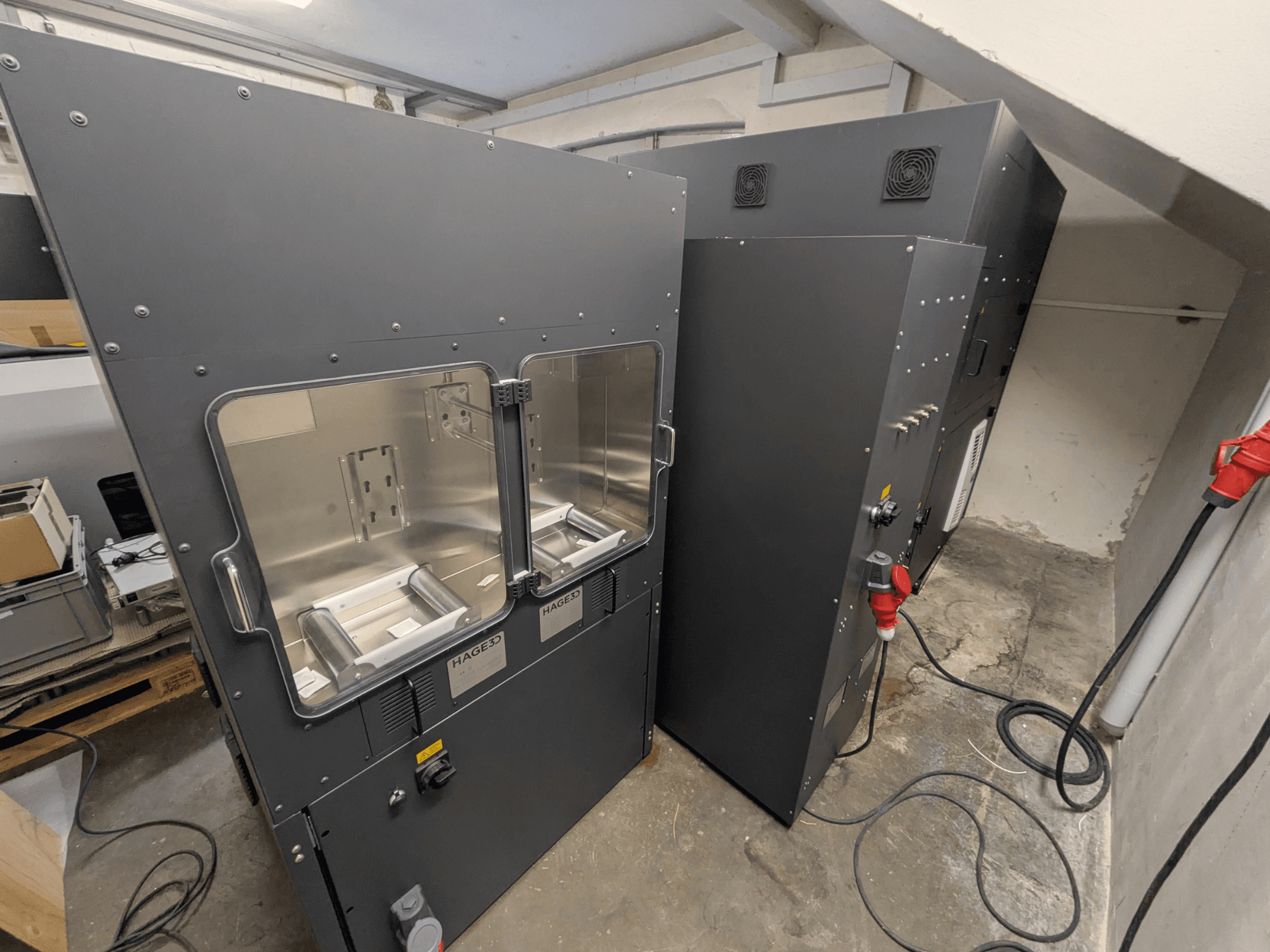 HAGE 3D Mex-One-A plastic 3D printer, side view showing dual transparent doors and control panel.