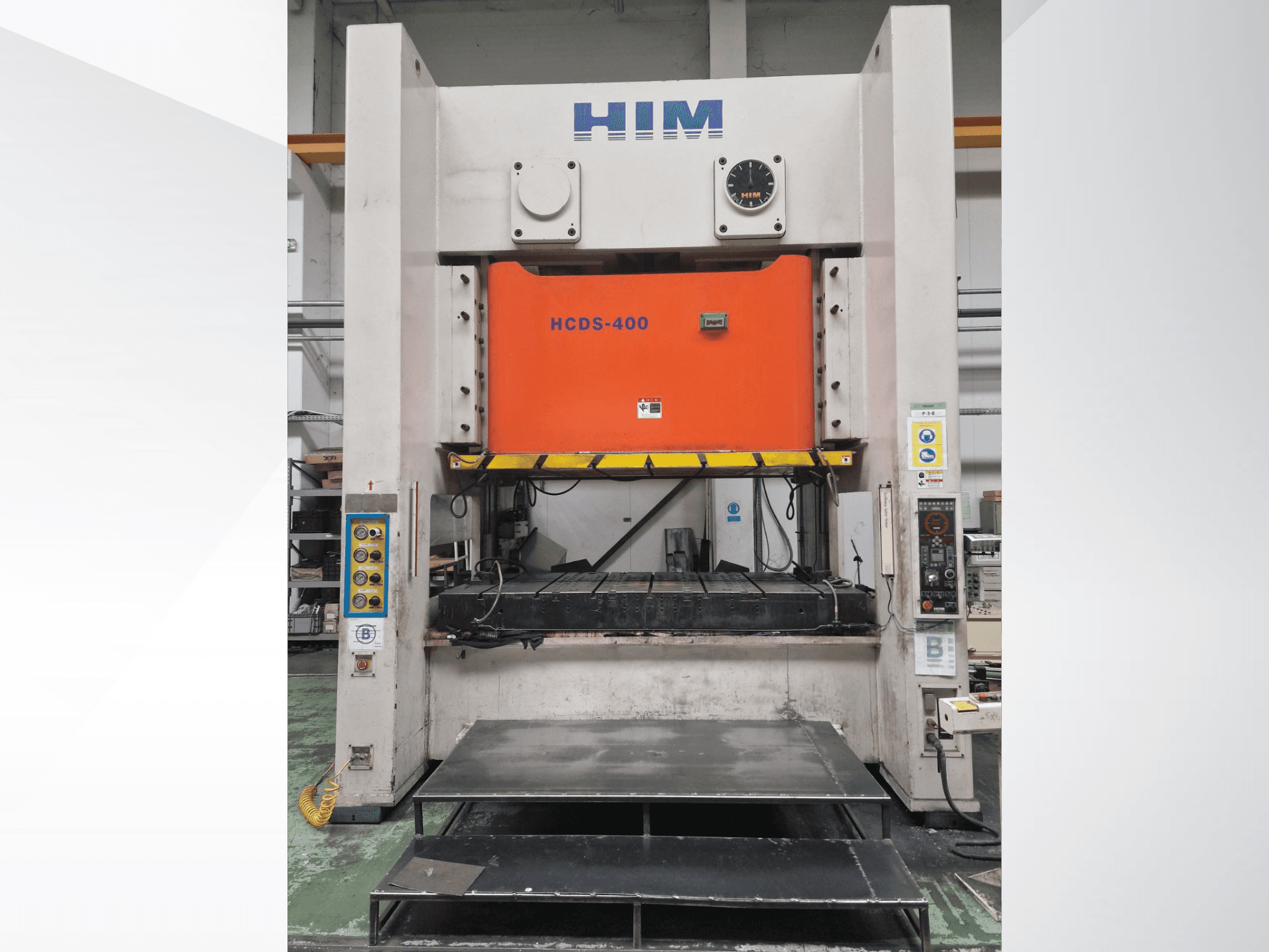 Front view of HIM HWAIL PRESS HCDS-400 mechanical stamping press with an orange stamping plate and control panel.