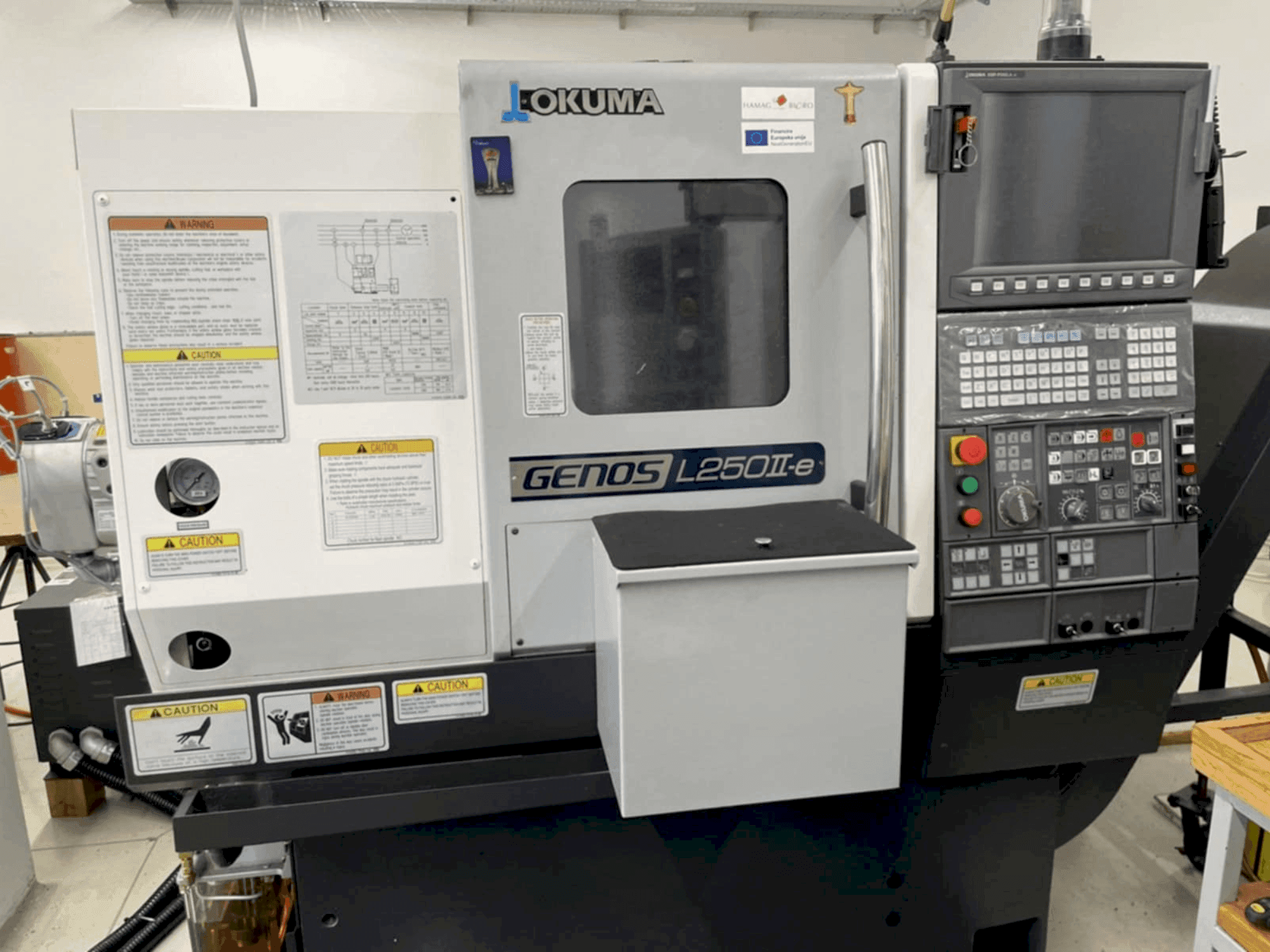 Front view of Okuma GENOS L250IIe machine