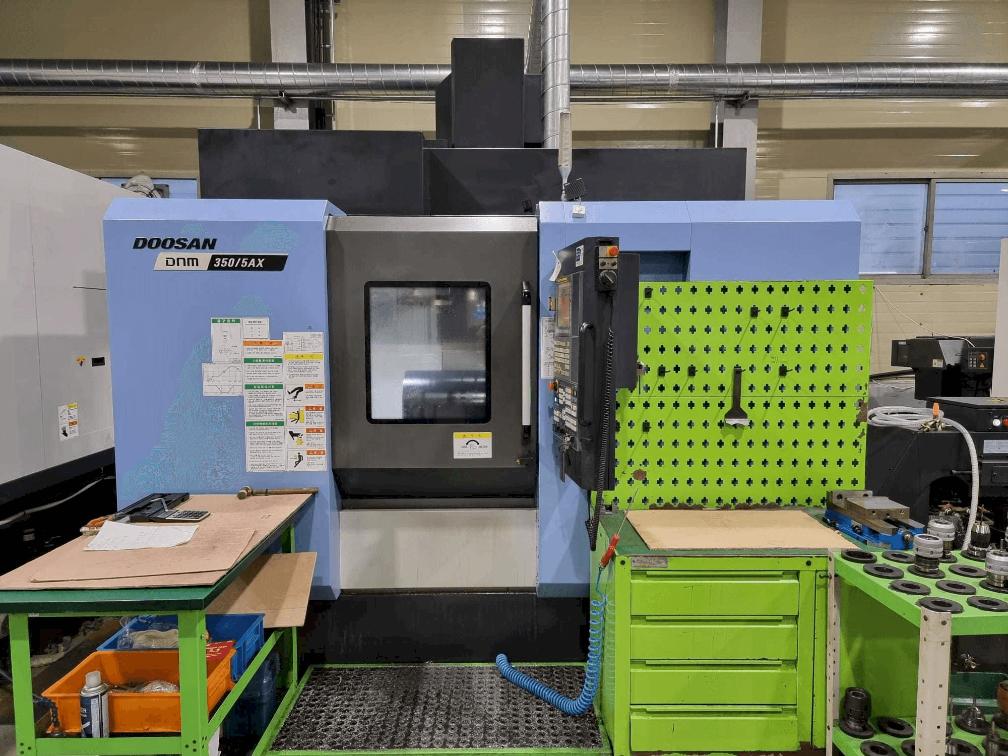 Front view of Doosan DNM350/5AX machine