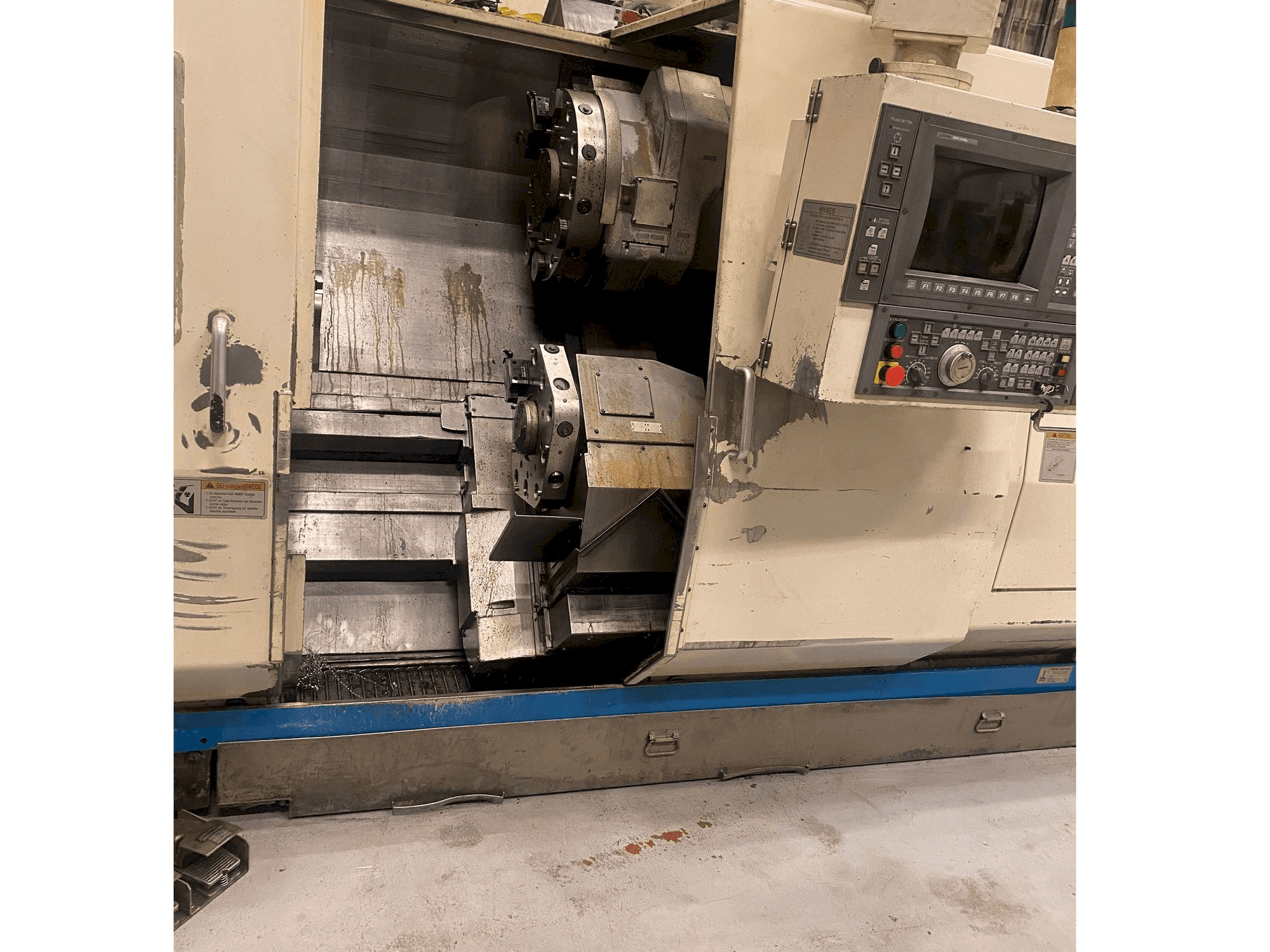 Left view of Okuma LU 25 machine