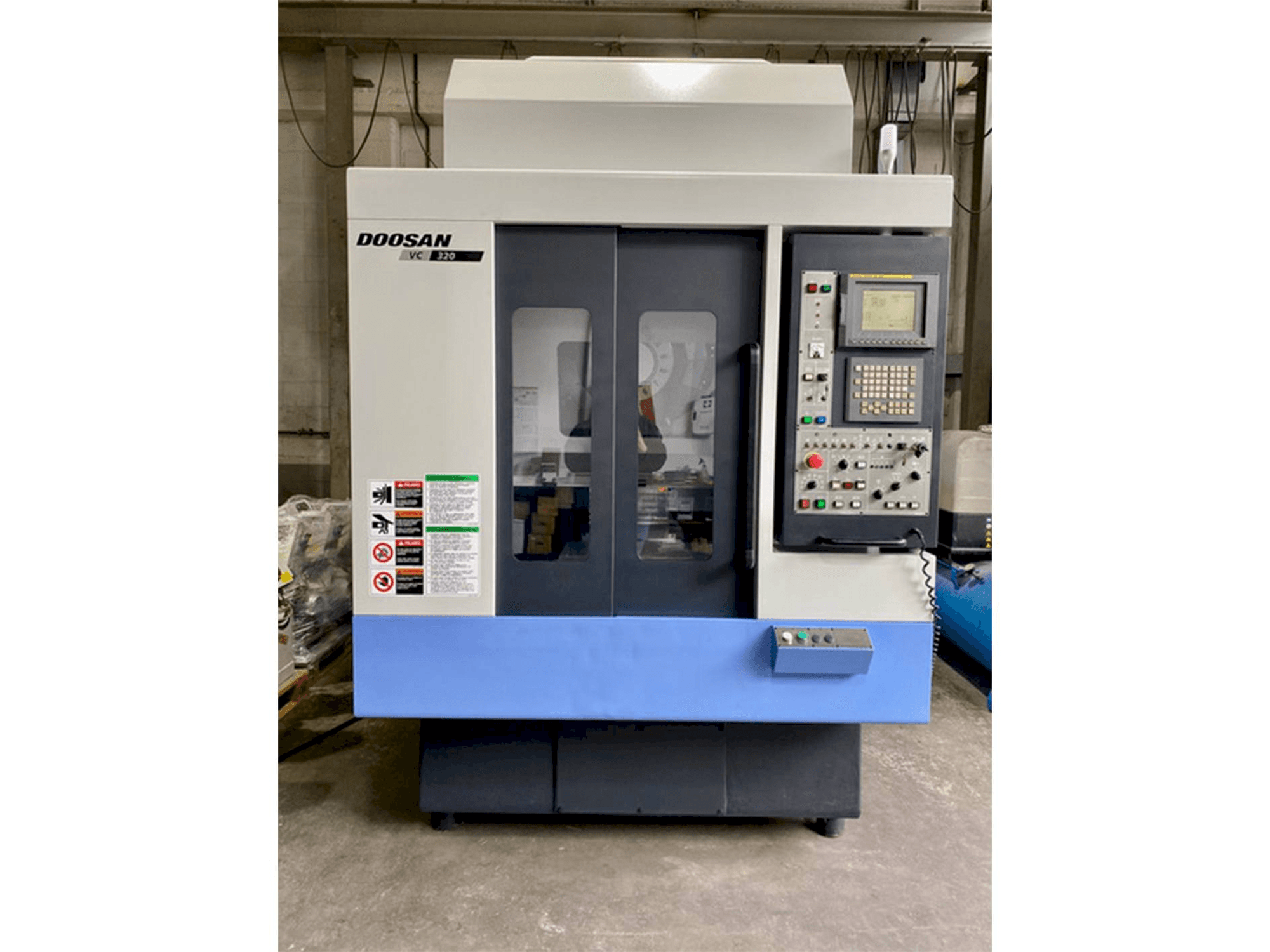 Front view of Doosan VC 320 machine