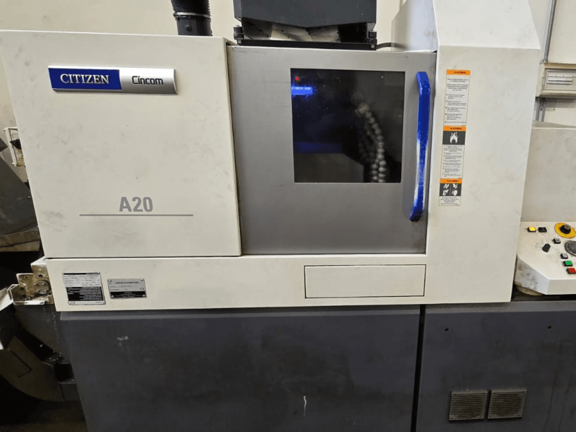 Citizen A20 Swiss Type Turning Machine, front view, with display panel and control buttons visible.