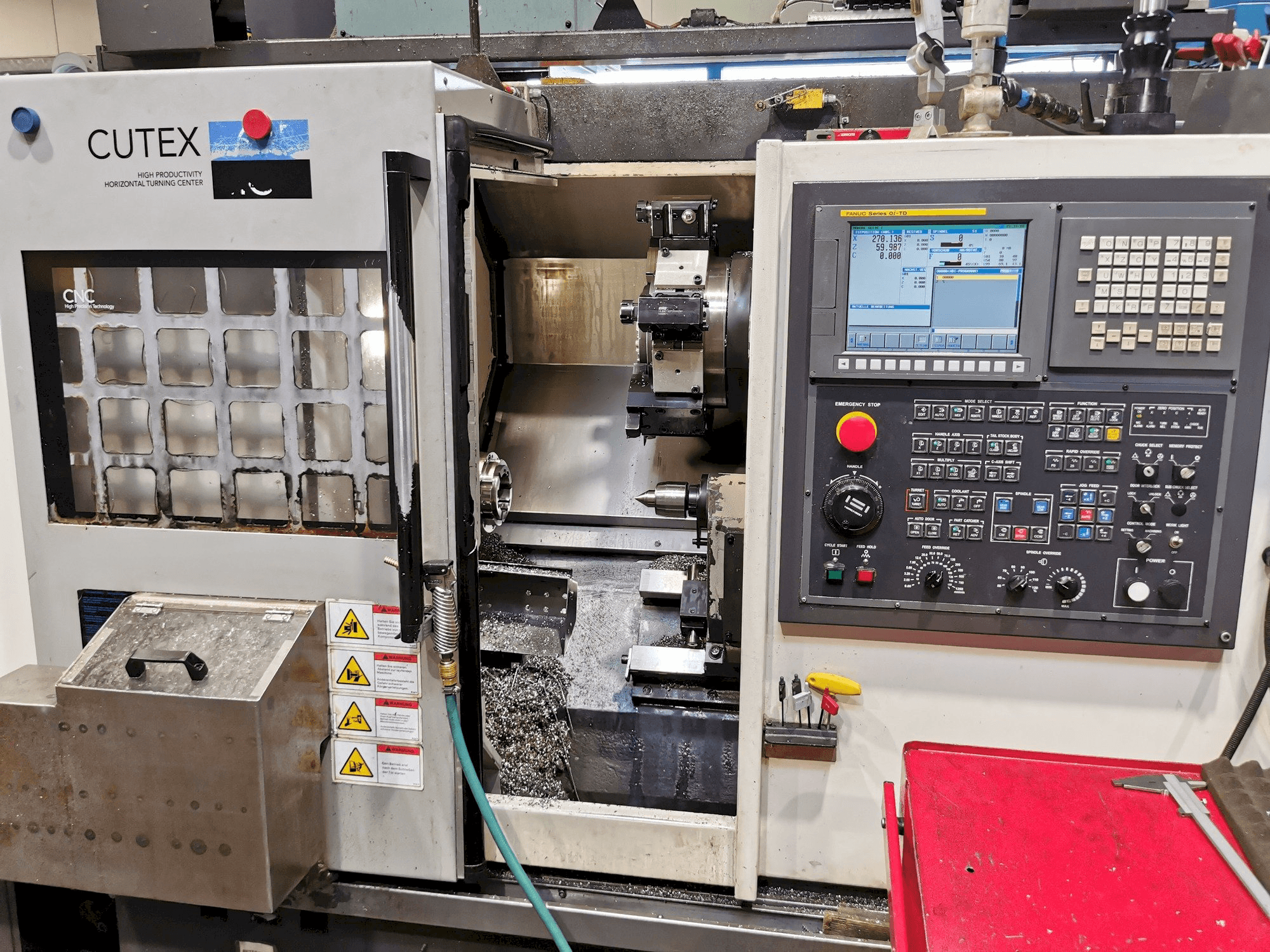 Front view of HWACHEON CUTEX 160B MC machine