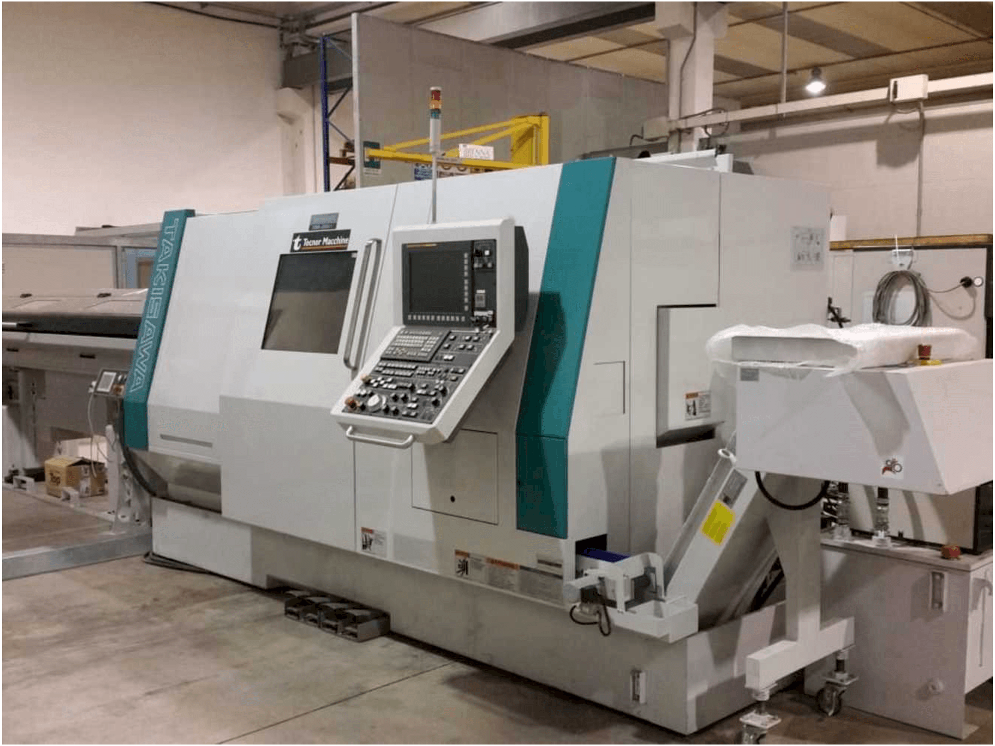 Front view of Takisawa TMMY-250 M1 machine