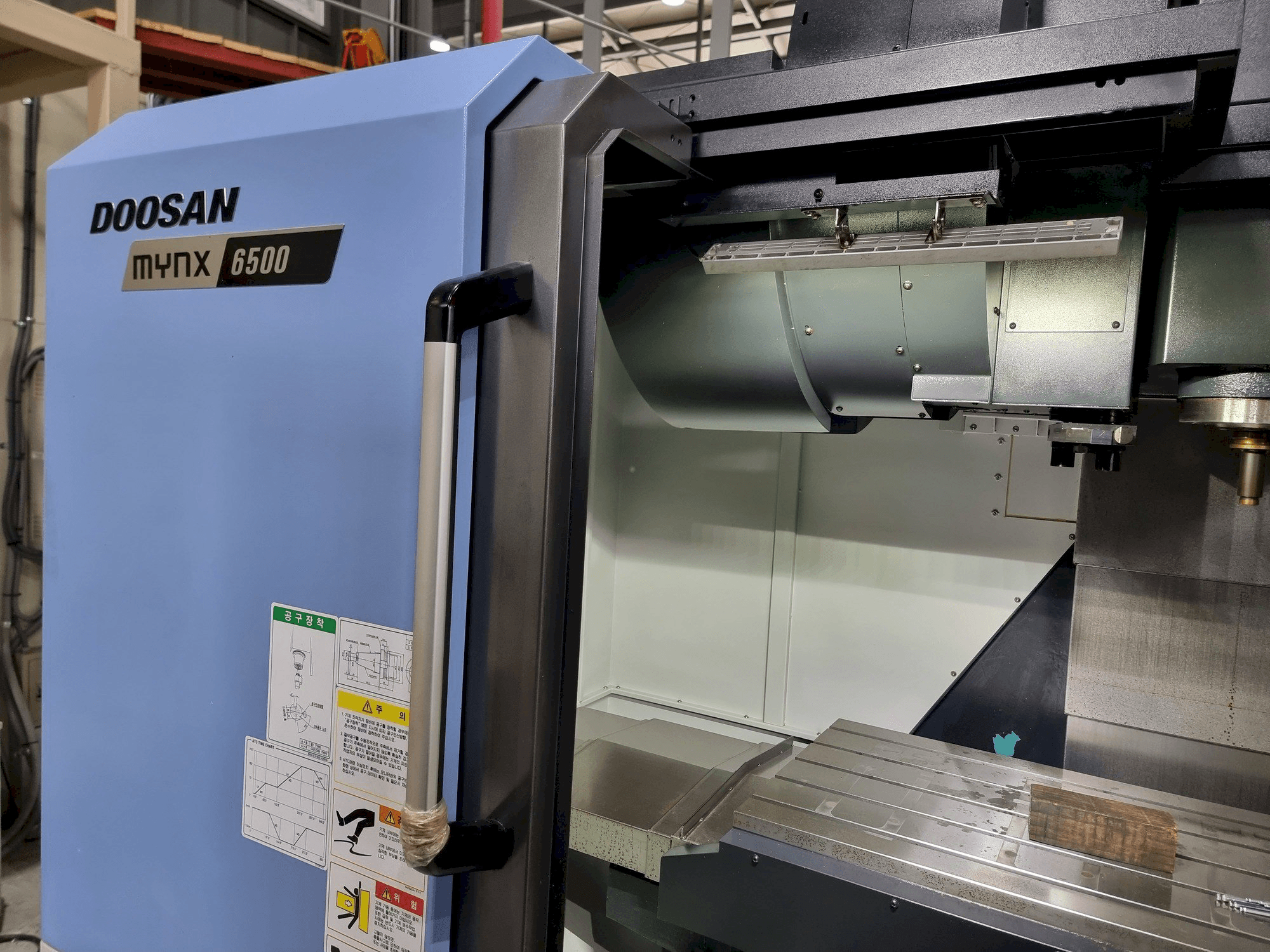 Front view of DOOSAN MYNX 6500 machine