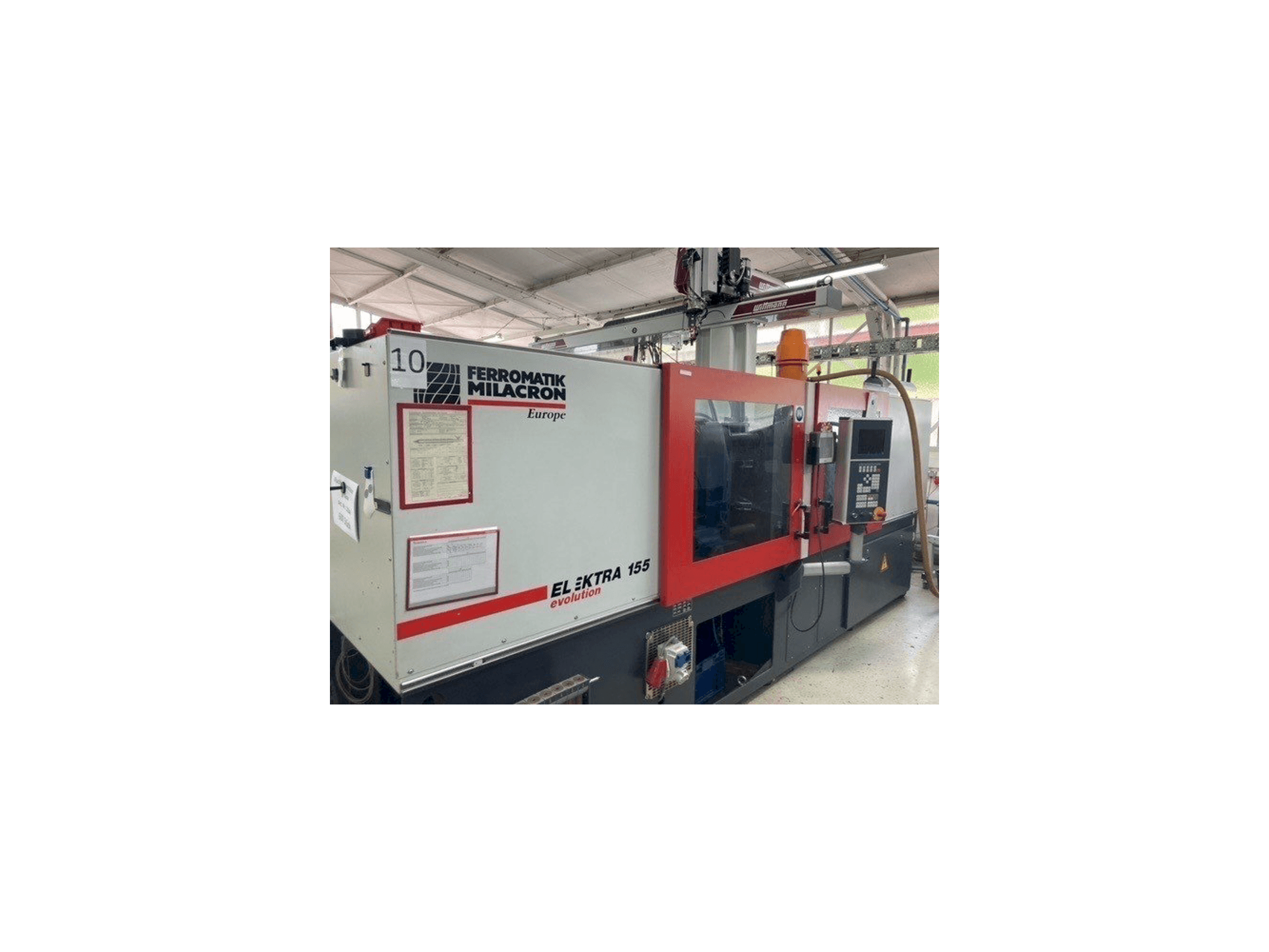 Front view of FERROMATIK MILACRON EE 155 machine