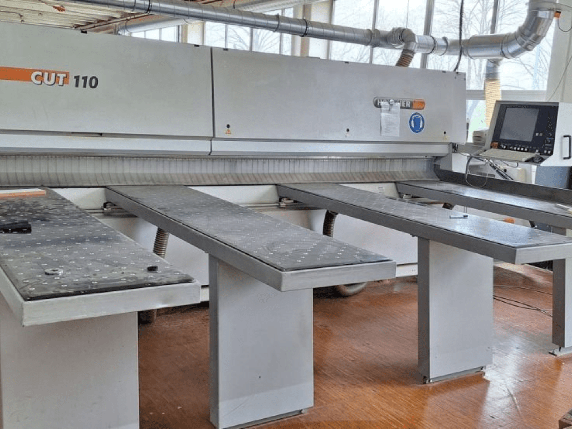 HOLZHER 6310 CUT 110 panel saw in front view, featuring two horizontal tables and a digital control panel.