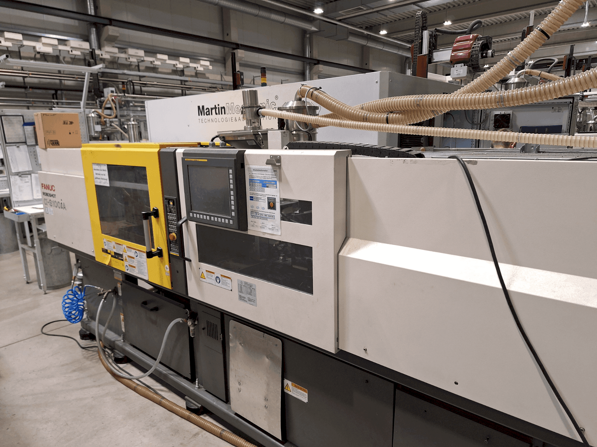 Front view of FANUC Roboshot S100iA machine