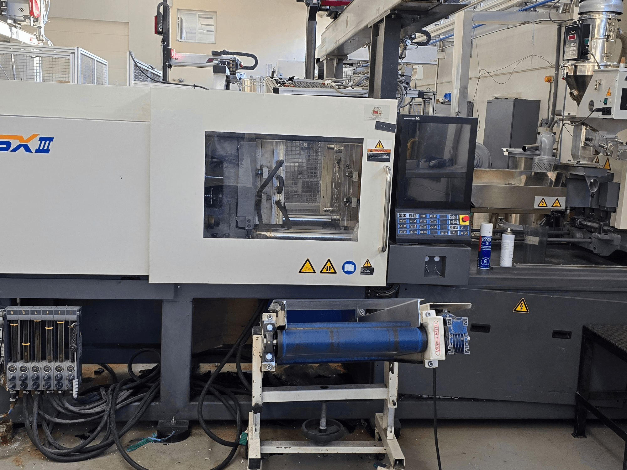 SHIBAURA EC130SXIII-4A electrical injection moulding machine, front view, showcasing control panel and hydraulic components.