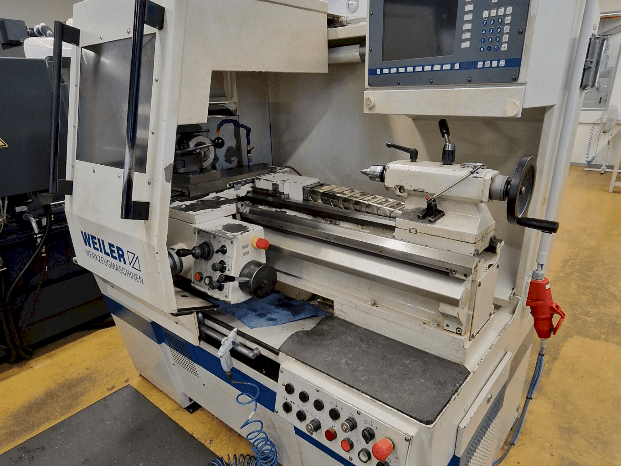 Front view of Weiler E30 machine