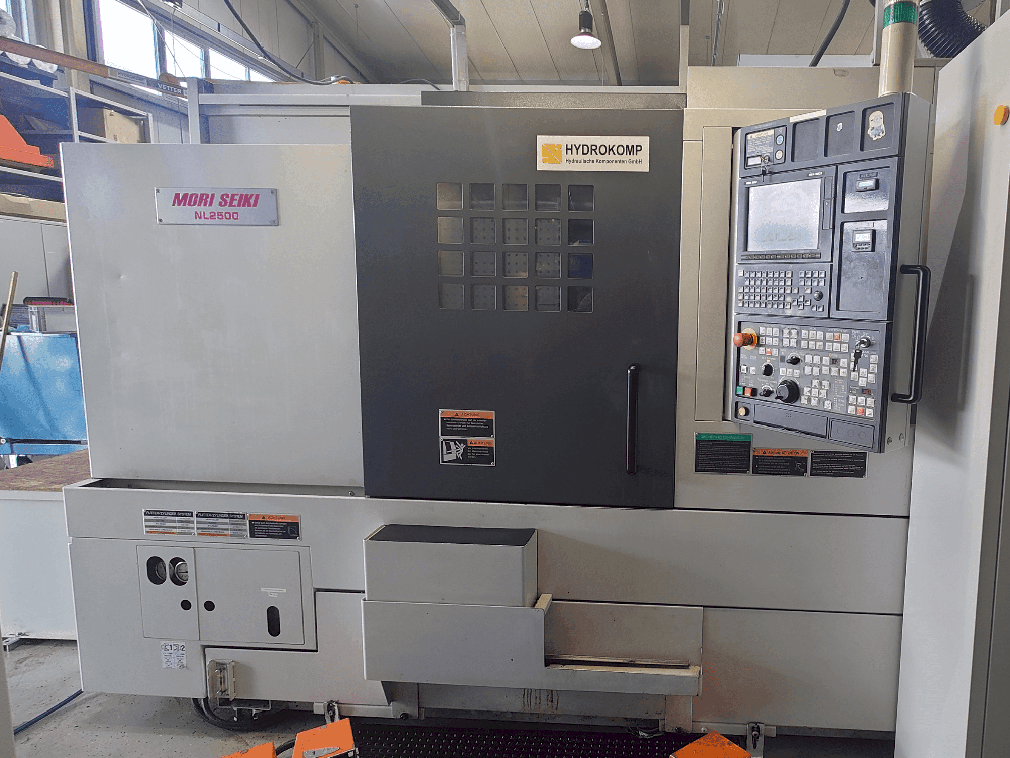 Front view of DMG Mori Seiki NL2500SY/700 machine