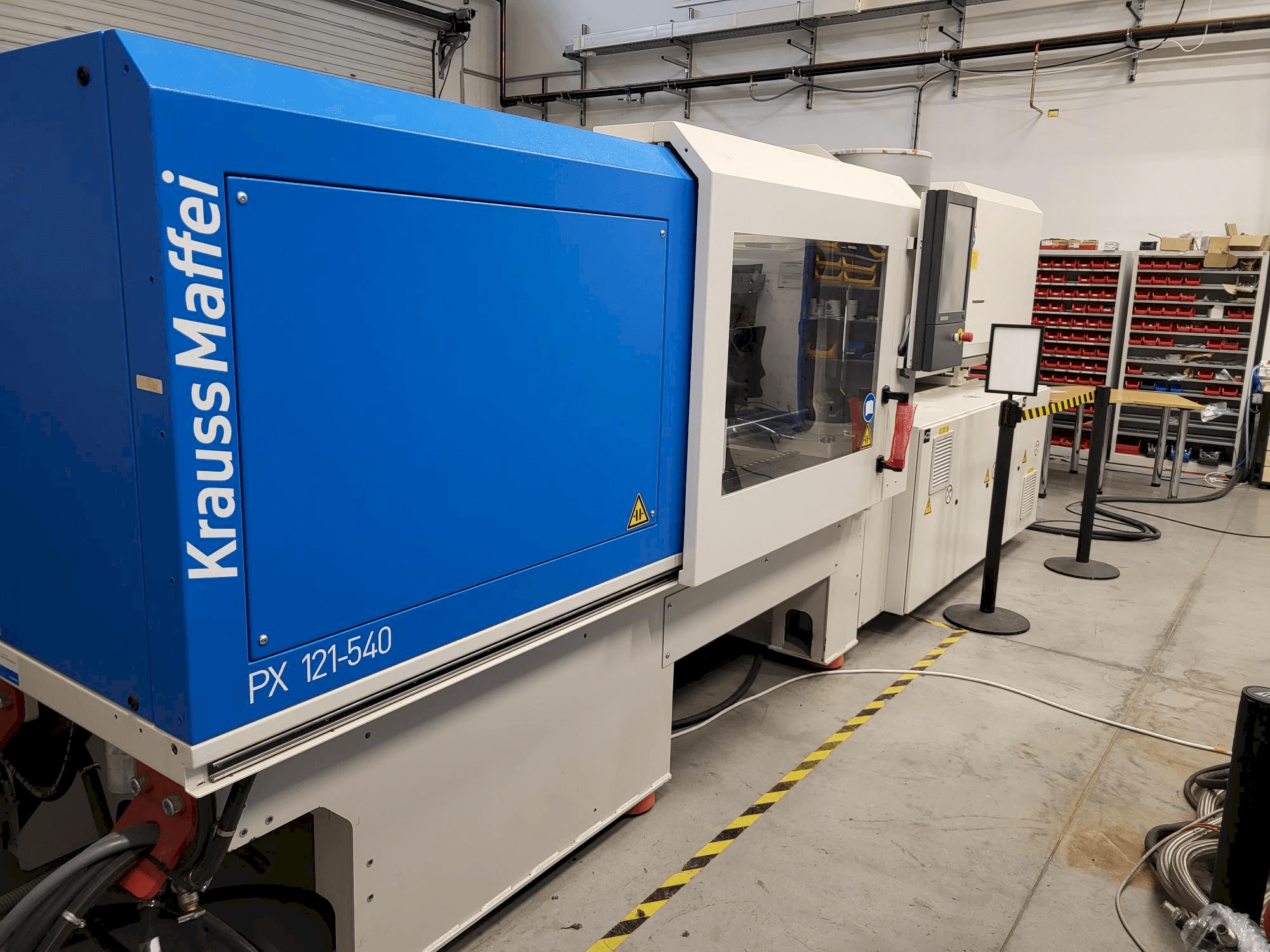 Left side view of Krauss Maffei PX 121-540 machine