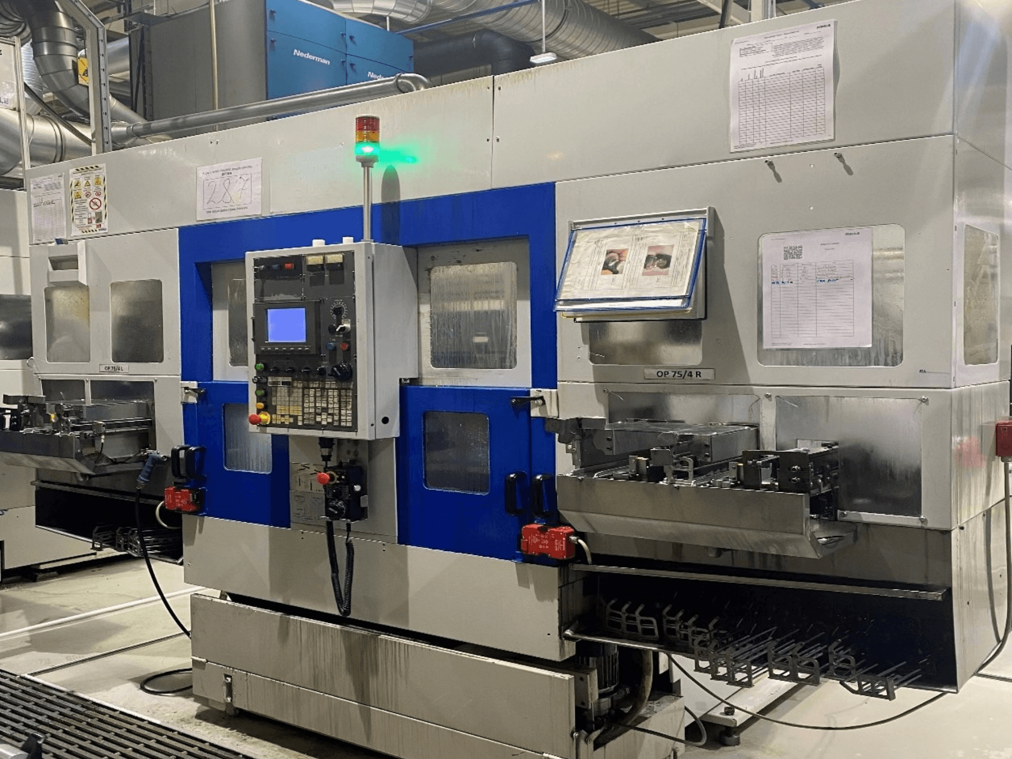 Front view of a MURATA MZ60 Horizontal Turning Machine with control panel, indicators, and tool holder visible.