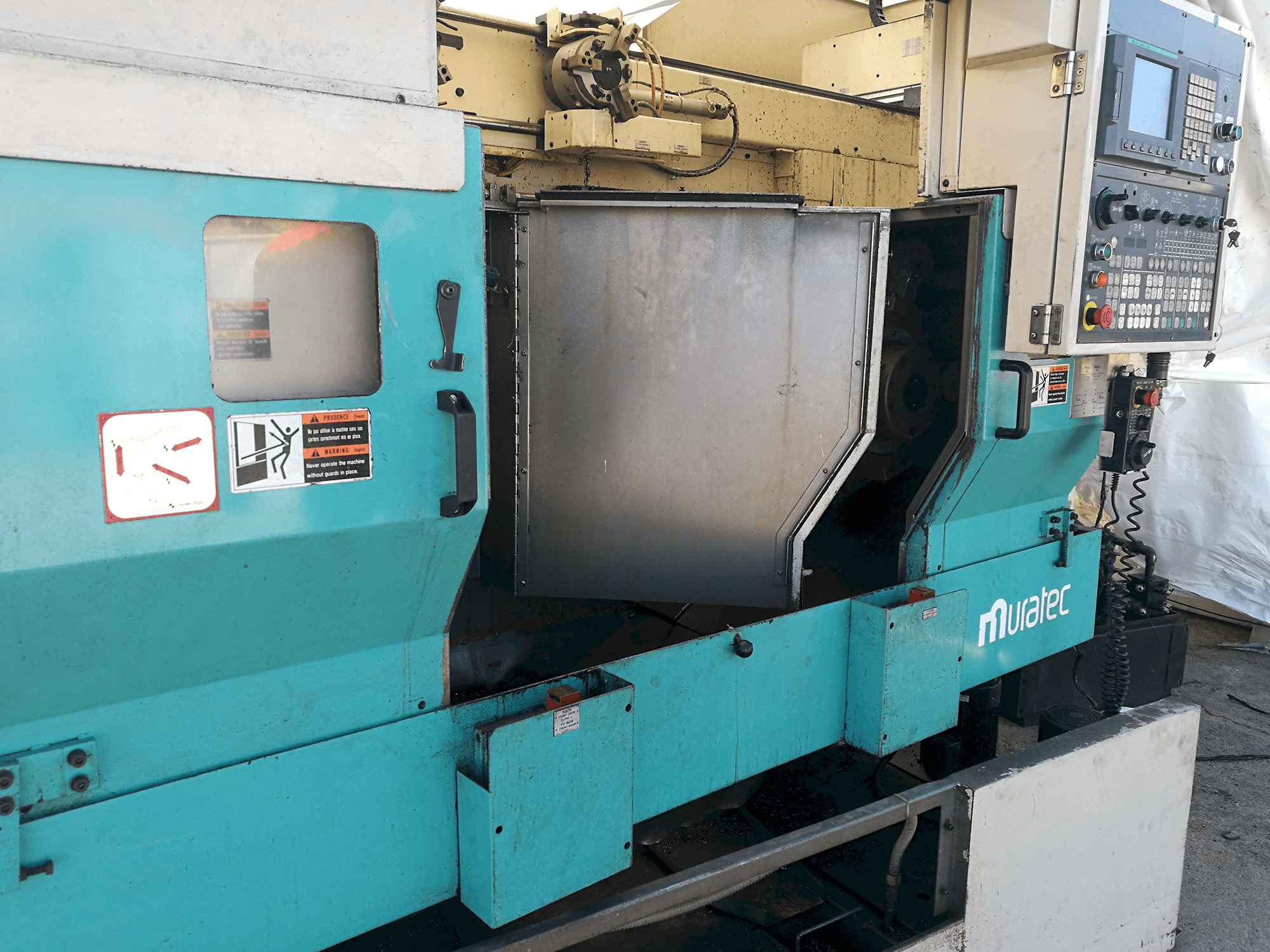 Left view of MURATA Muratec MW 200 Machine