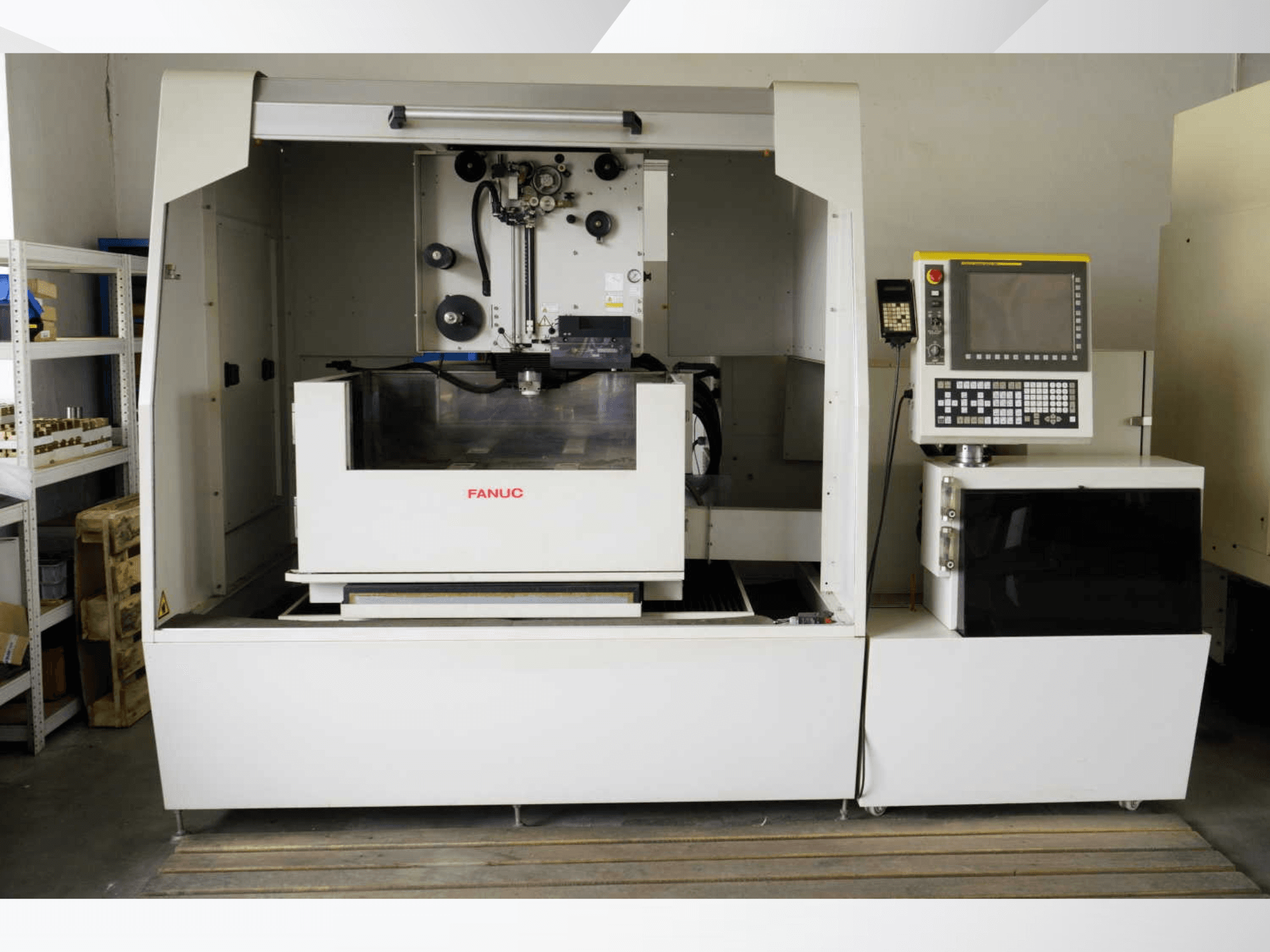 FANUC ROBOCUT alpha-1iD Wire EDM Machine, front view showcasing control panel and work area features.