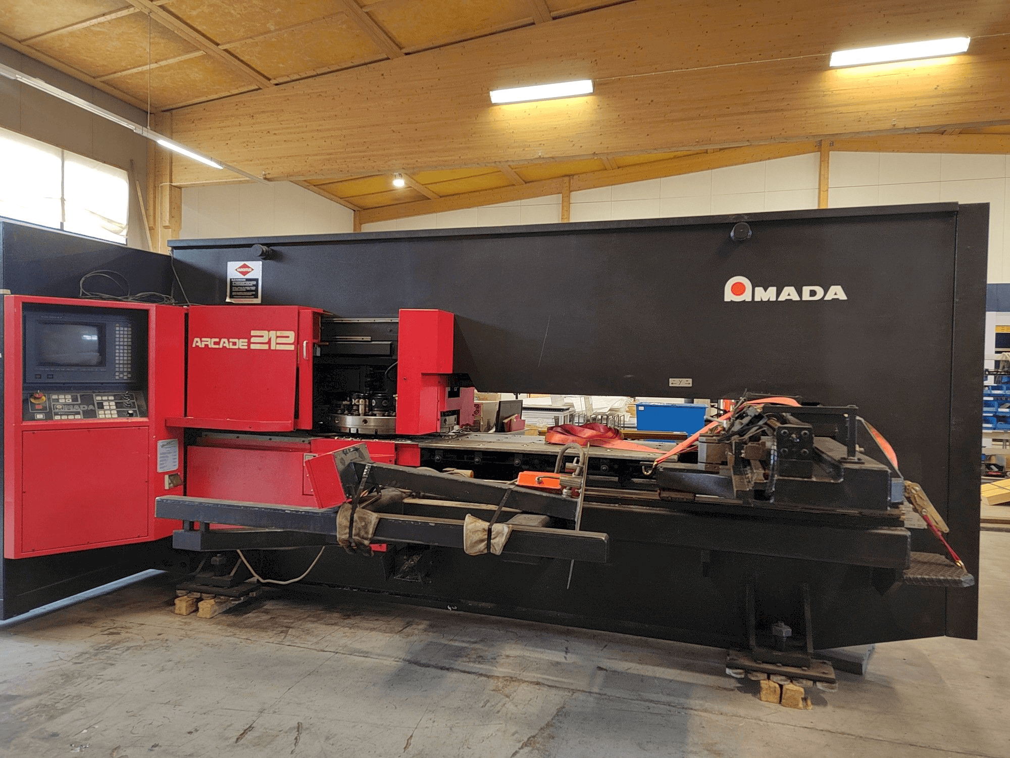 Front view of AMADA Arcade 212 machine