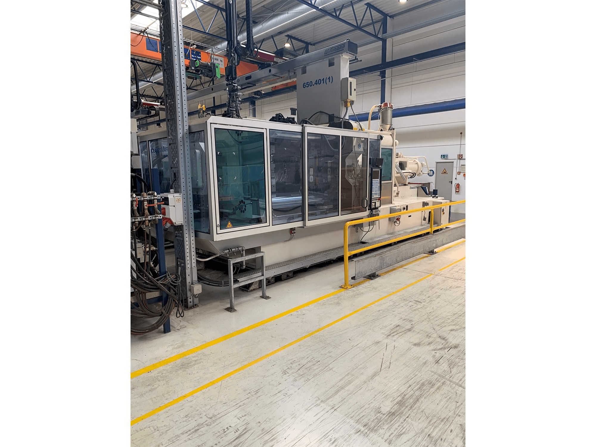 Front view of Krauss Maffei 650-2700-520 CL machine