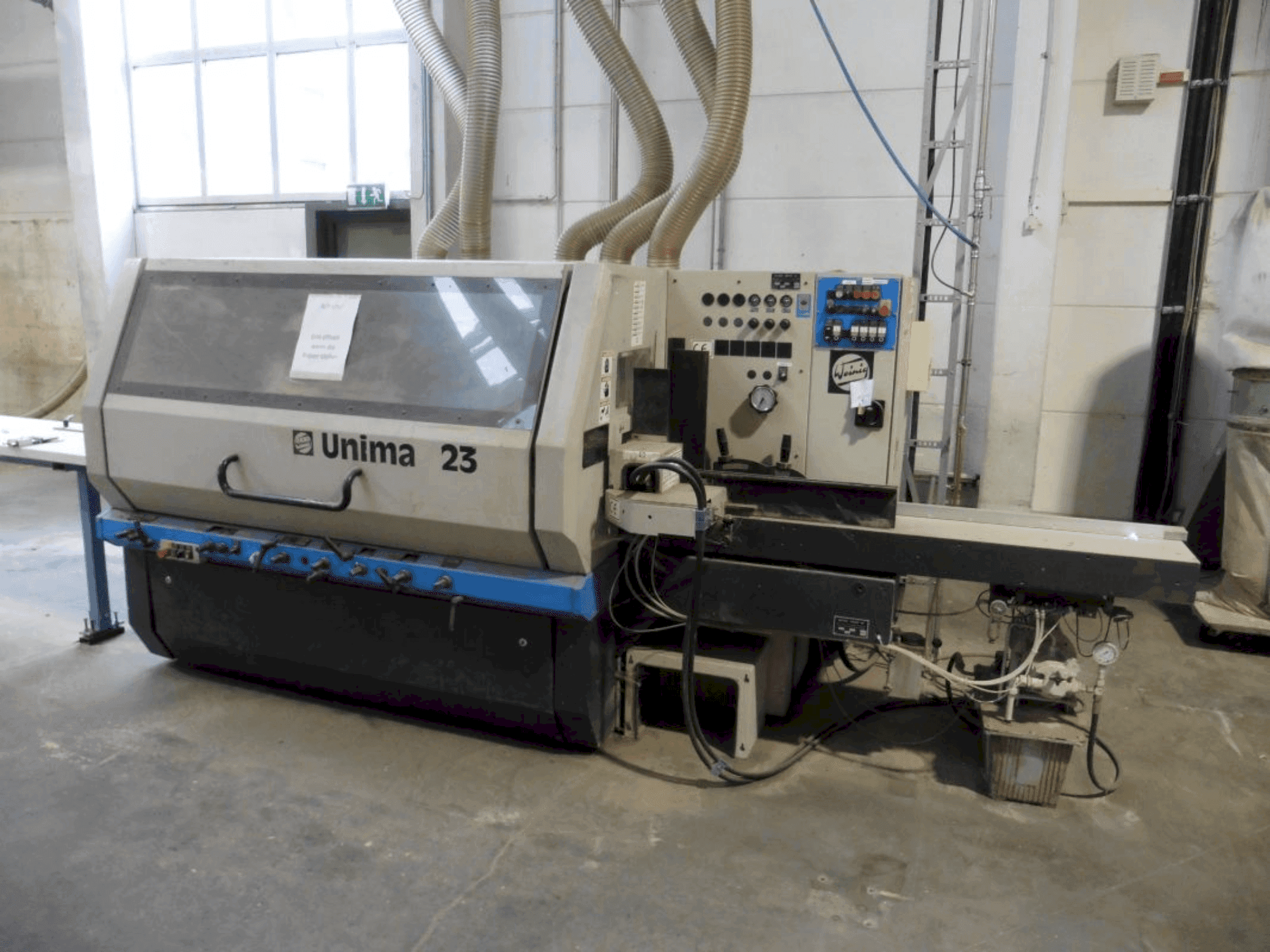 Front view of WEINIG / DIMTER Unimat 23 E machine