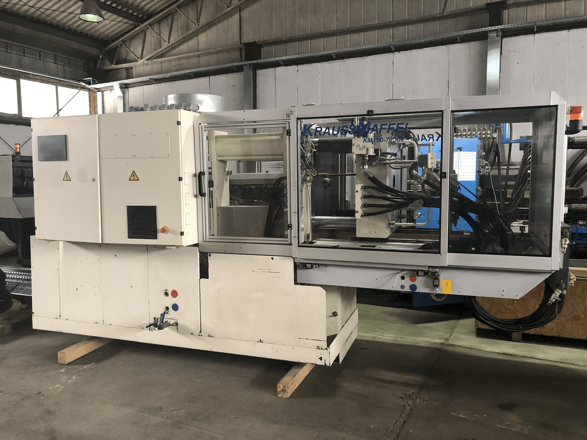 Front view of Krauss Maffei 150-700 C2 machine