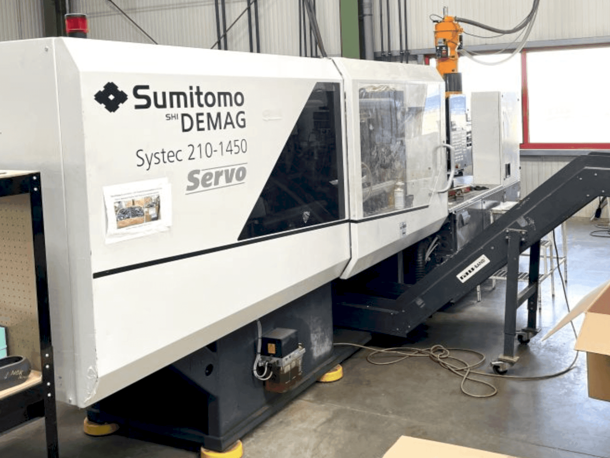 Front view of DEMAG System 210-1450 machine