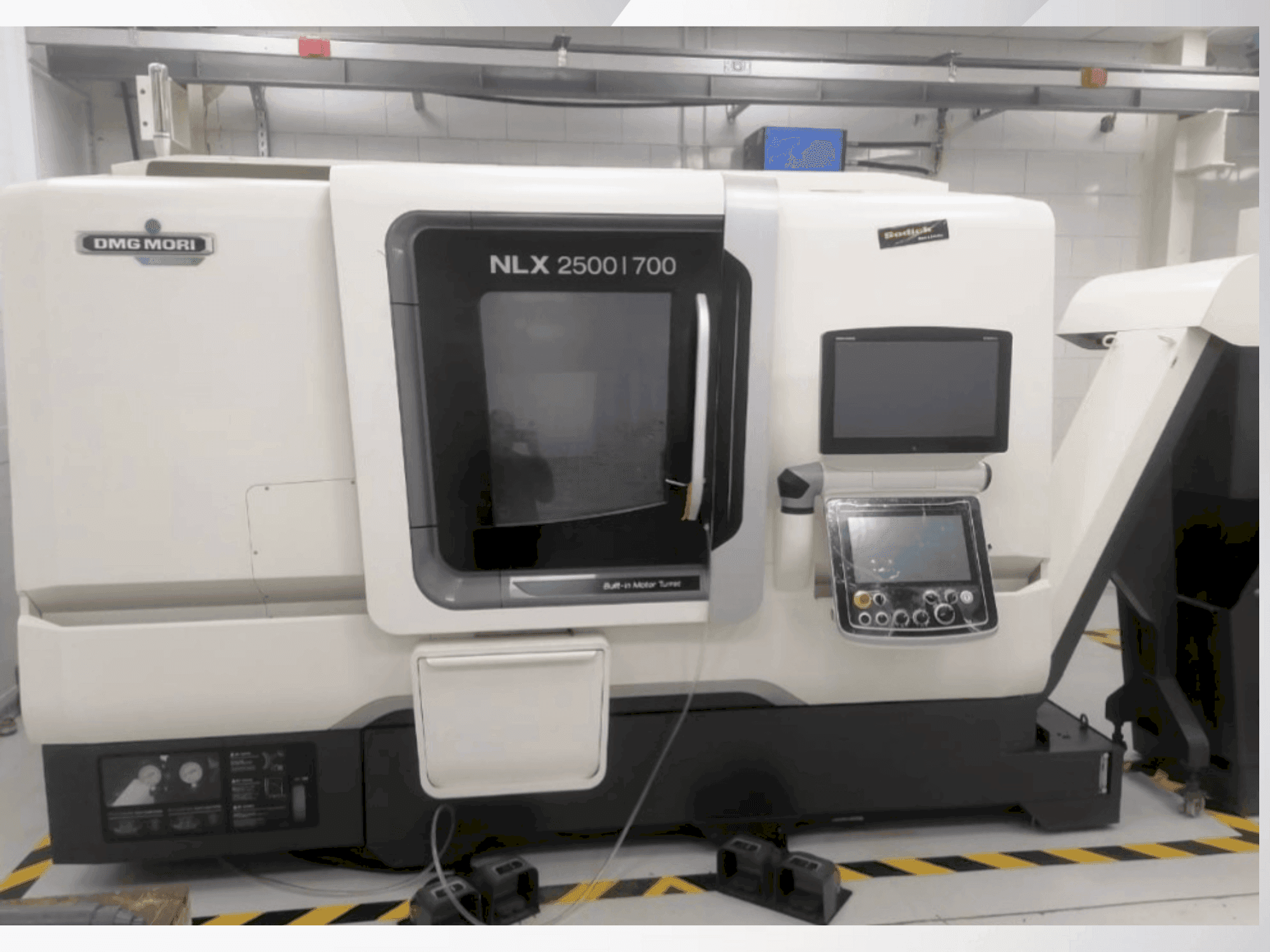 Front view of DMG MORI NLX 2500/700 machine