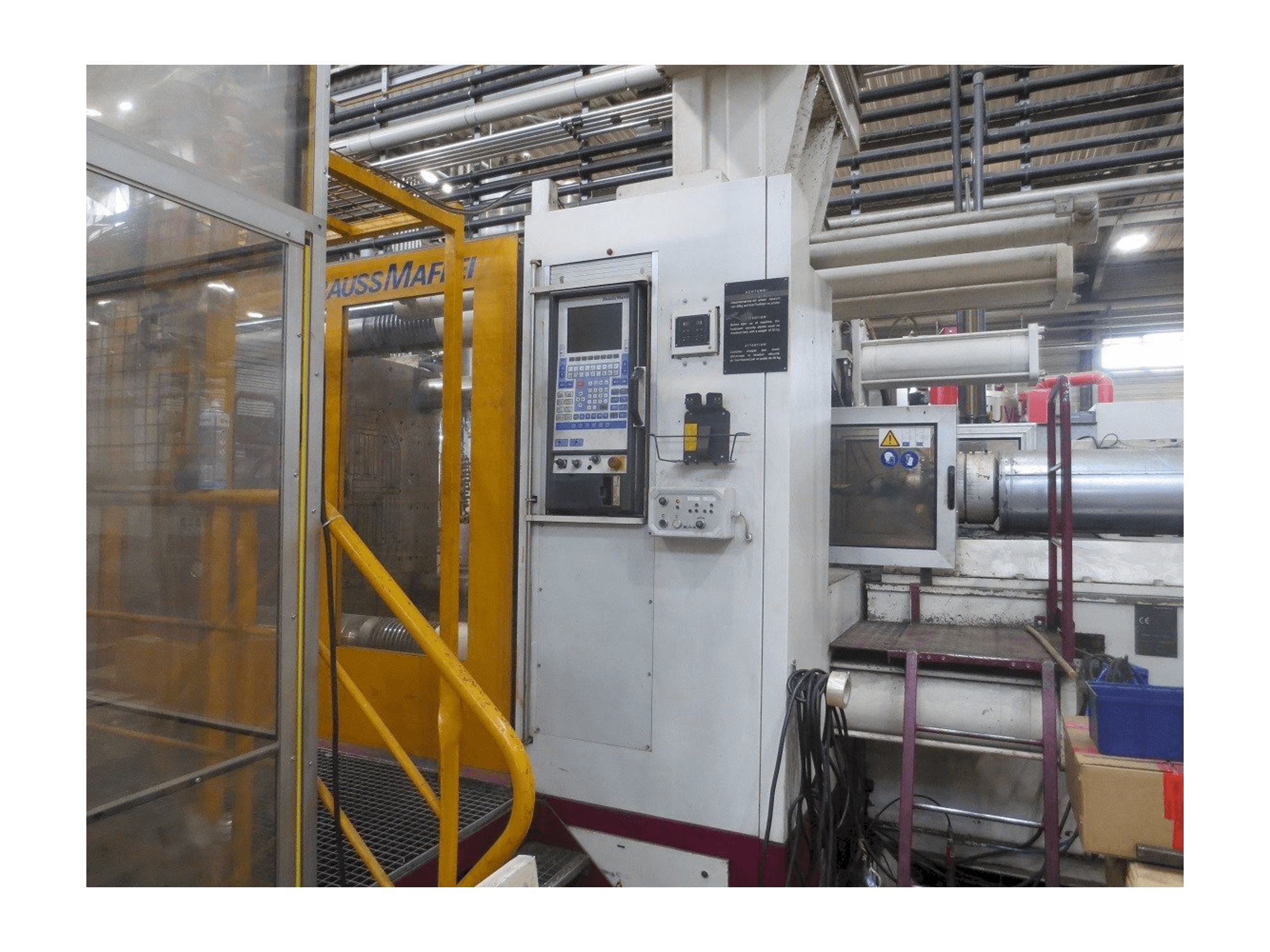 Front view of Krauss Maffei 1600-14700 MC machine