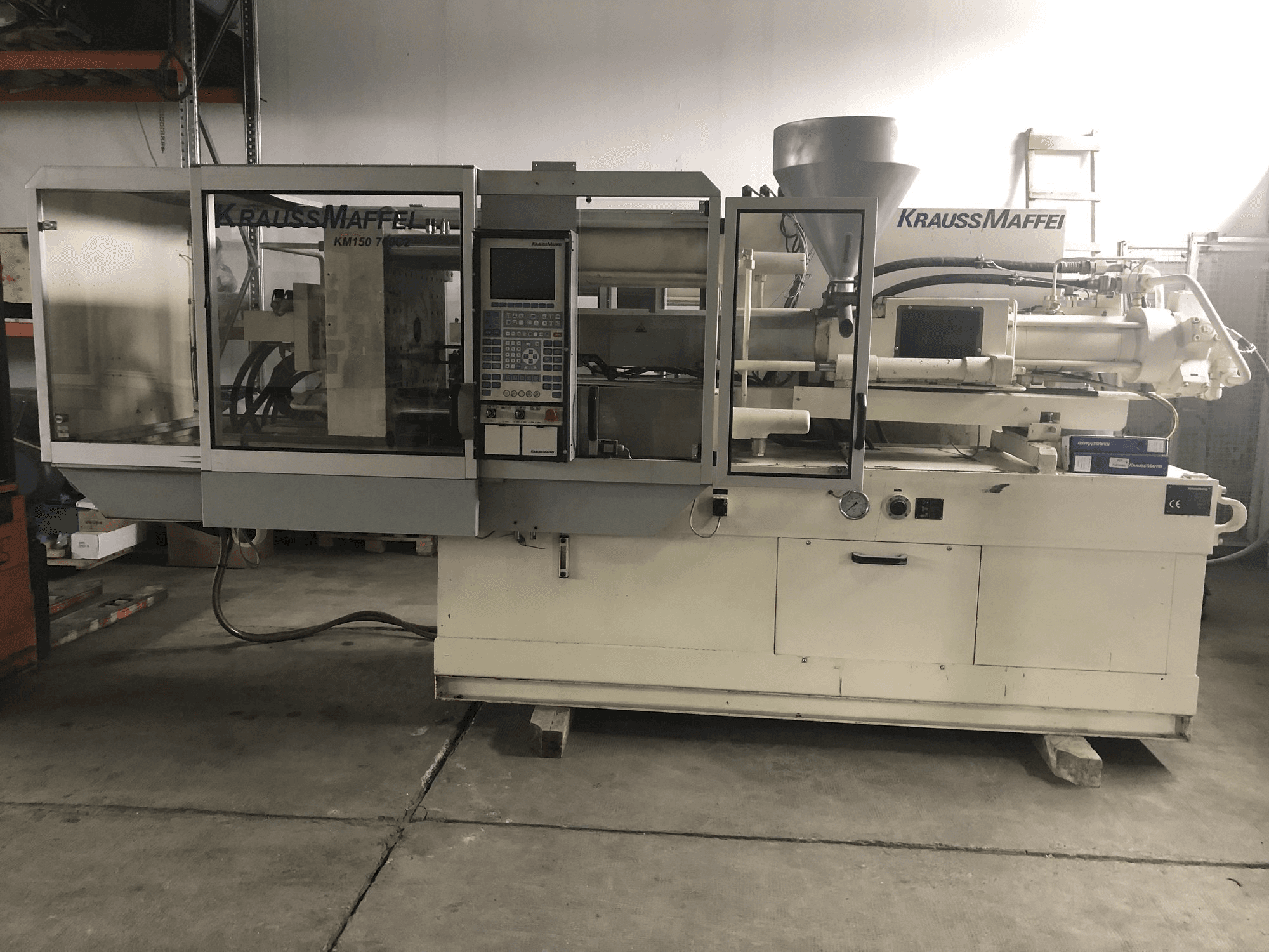 Front view of Krauss Maffei 150-700 C2 machine