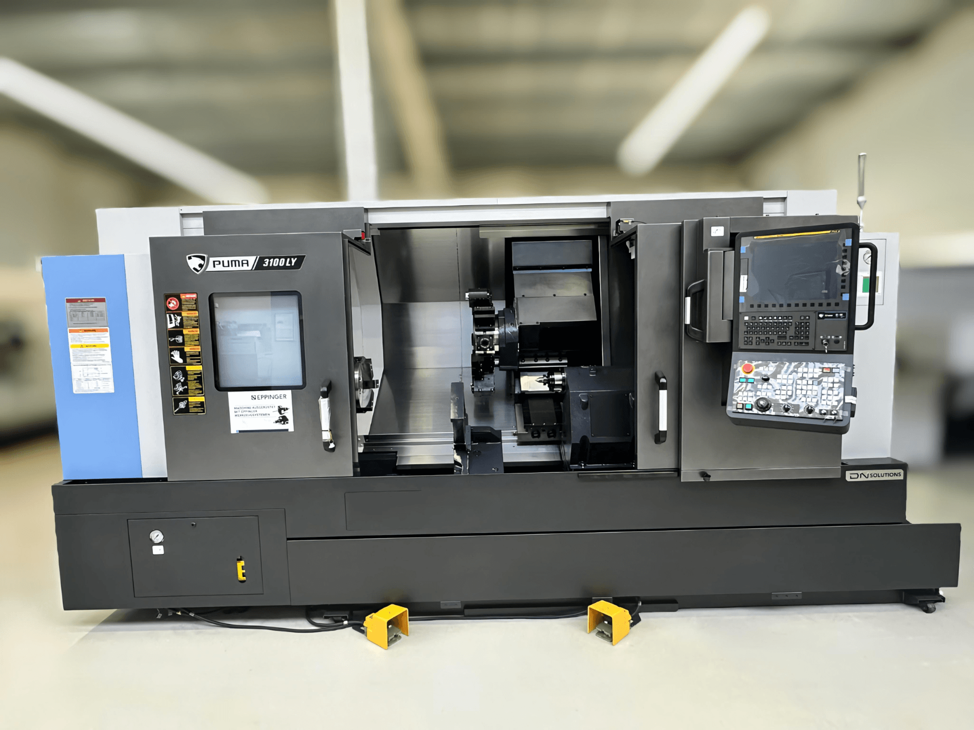 Front view of DN SOLUTIONS Puma 3100 LY turn-mill centre showcasing control panel, spindle, and operating features.