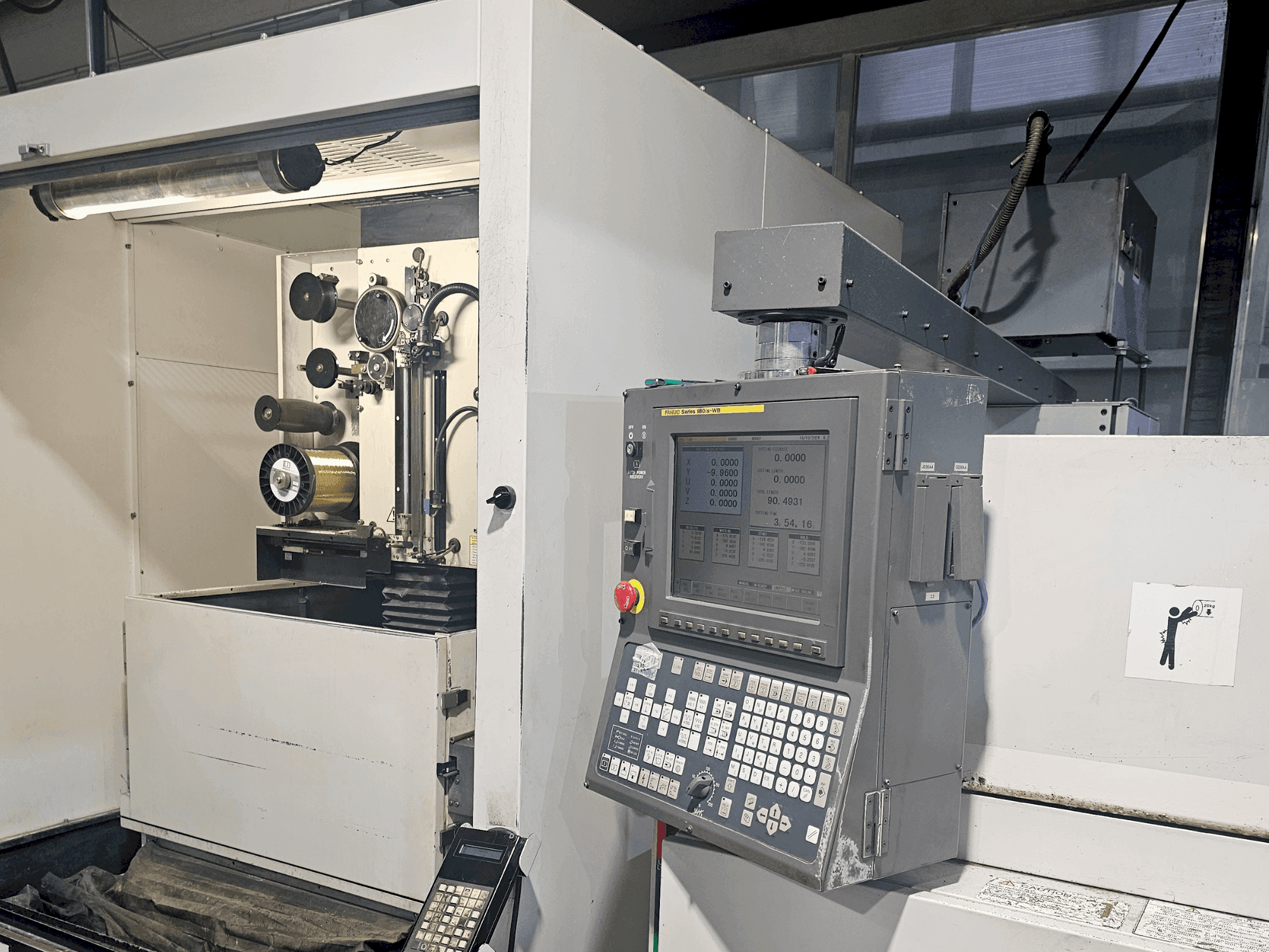 Front view of FANUC alpha 1iC machine