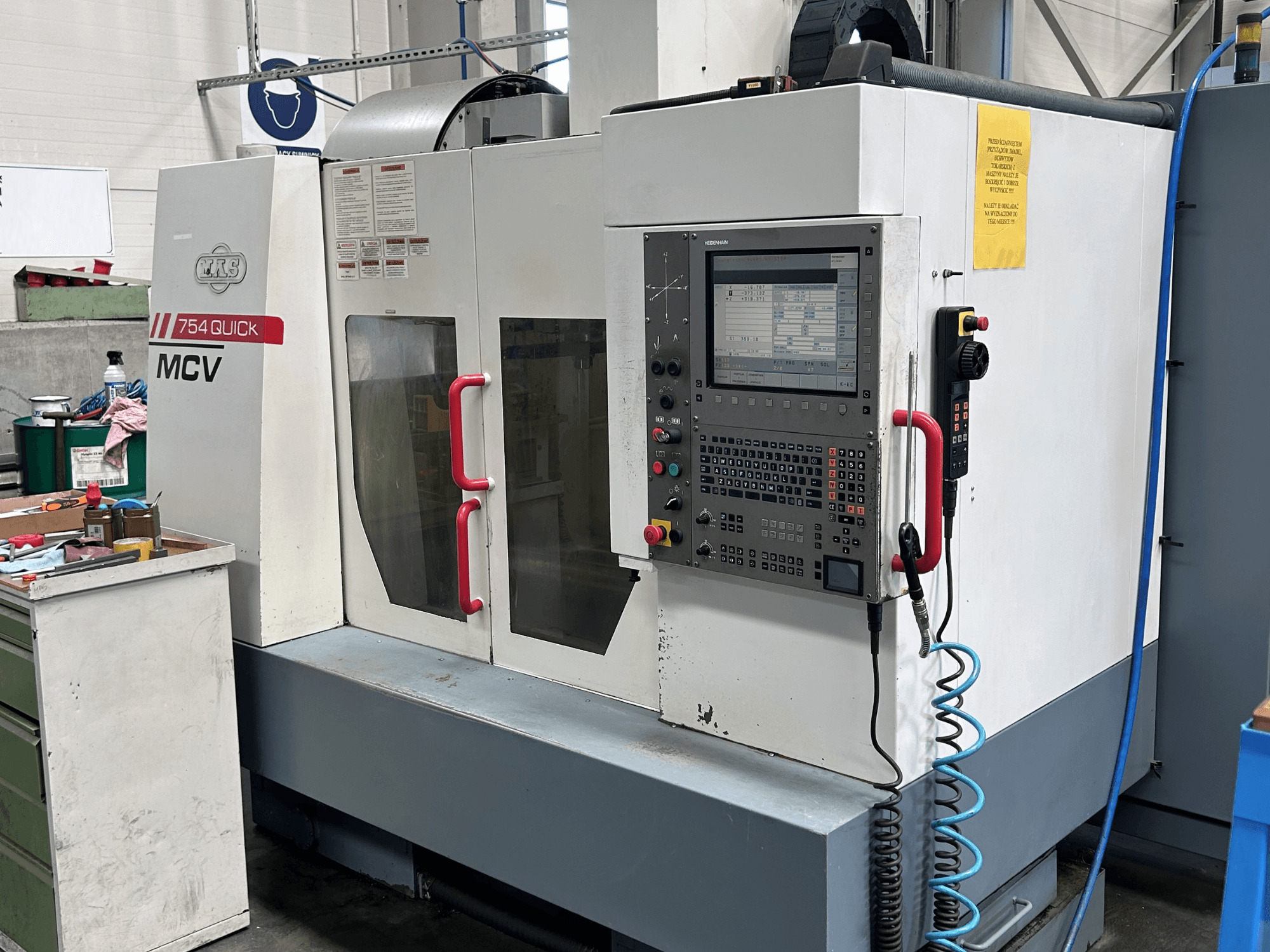 KOVOSVIT MAS MCV 754Q vertical machining center, front view, features control panel with touchscreen and operational buttons.