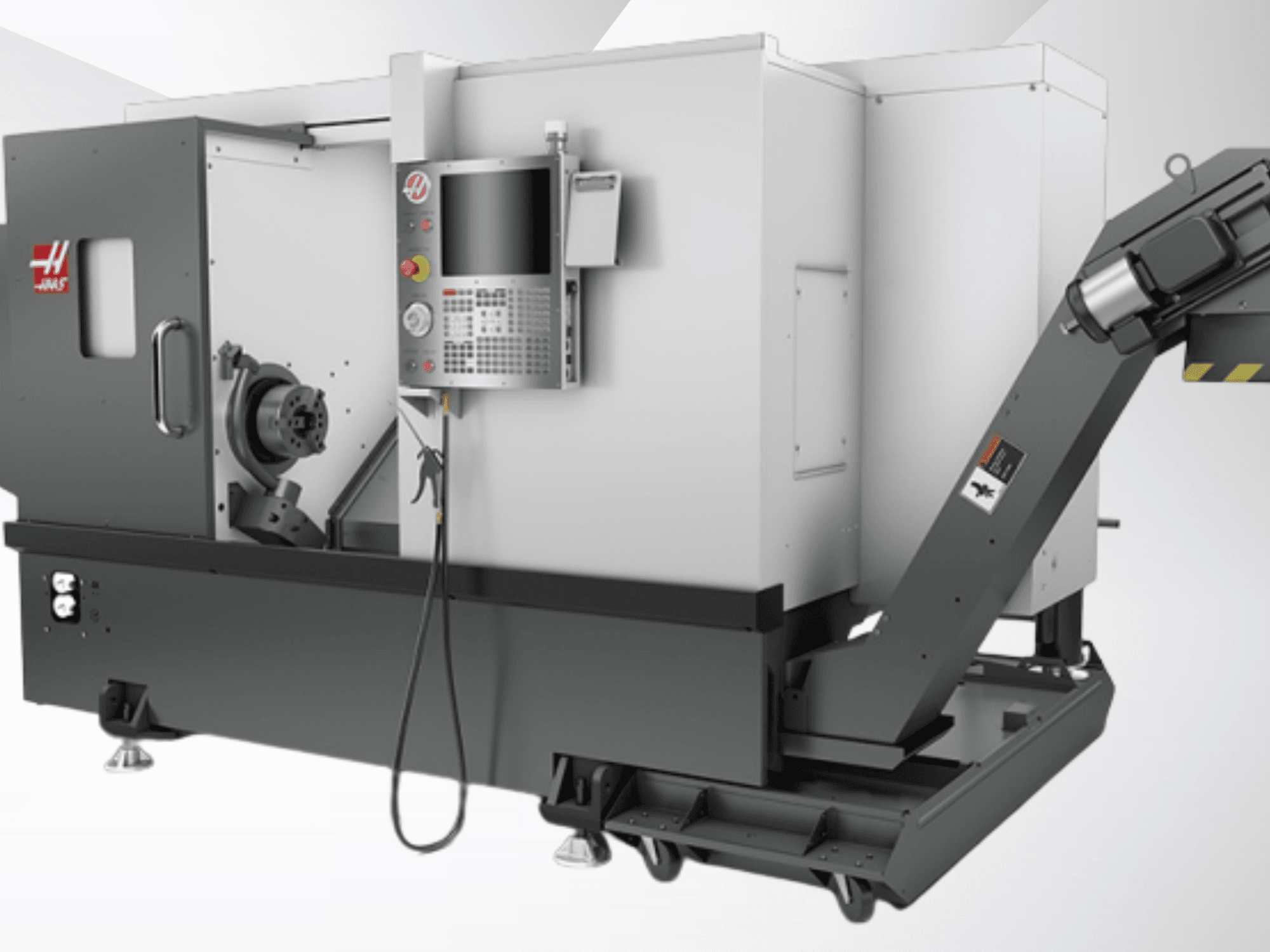 Haas ST-20 horizontal turning machine; front view showing control panel, spindle, and chip conveyer design.