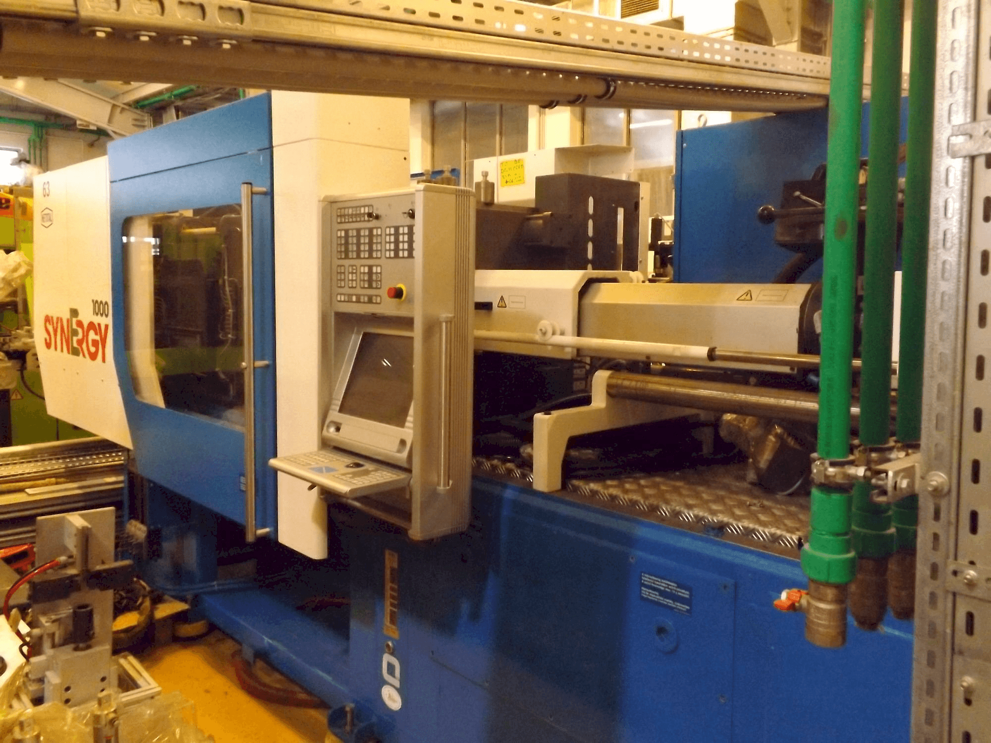 Front view of Netstal Synergy 1000 230-110 machine