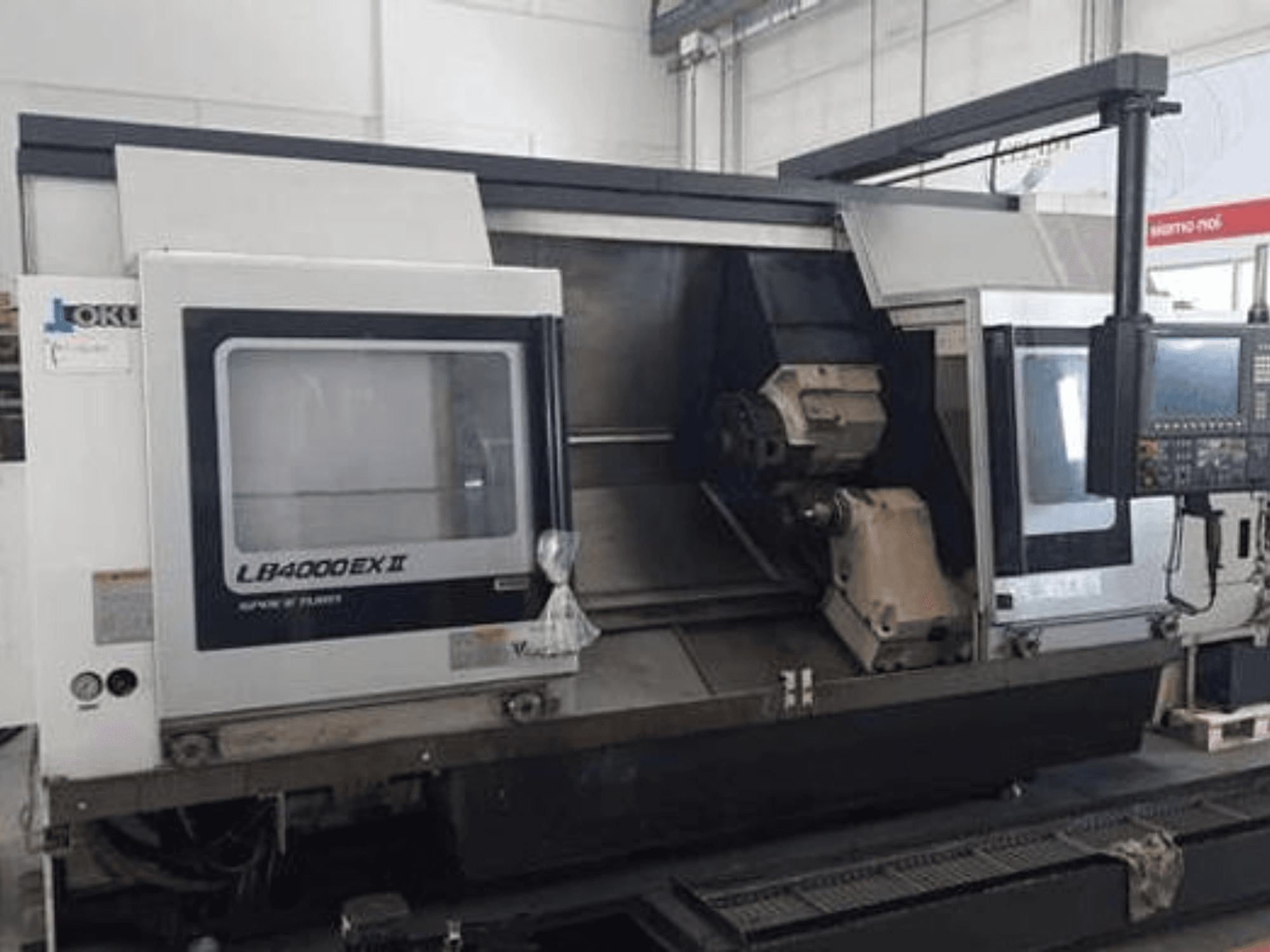 LATHES LB4000EX II by JOKI, front view showcasing control panel, spindle, and working area for precision machining.