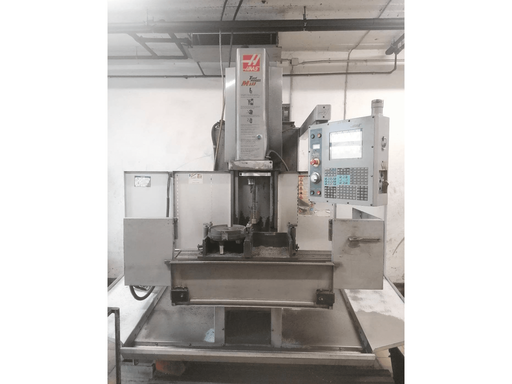 Front view of HAAS TM2-HE machine