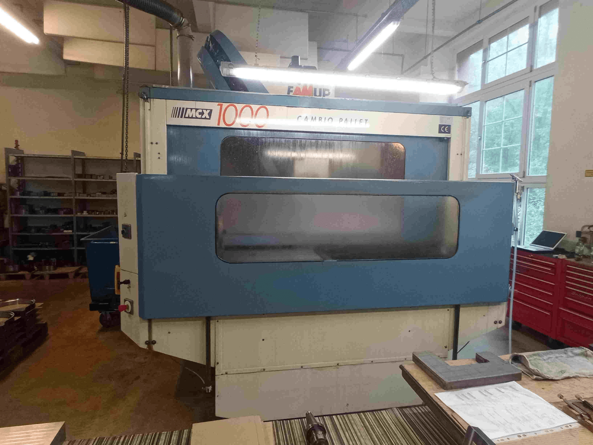 FAMUP MCX 1000 vertical machining centre, front view, showcasing control panel and large machining area.