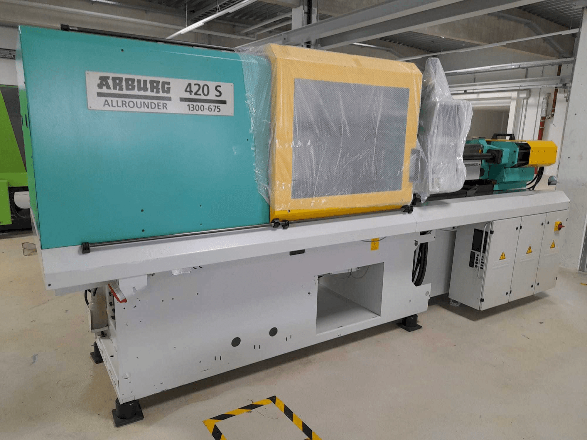 Front view of Arburg Allrounder 420S 1300-675 machine