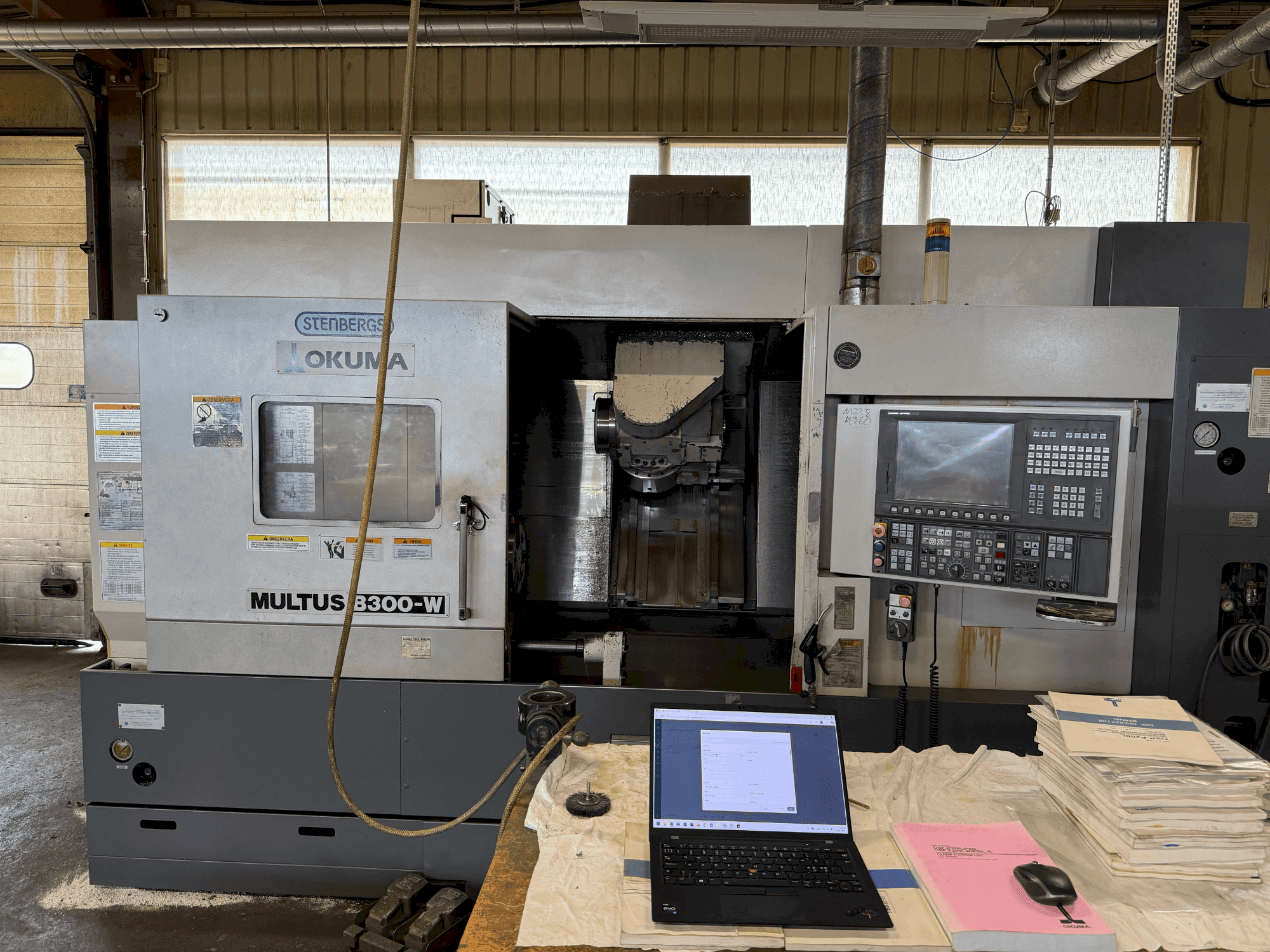 Front view of Okuma Multus B300-W machine