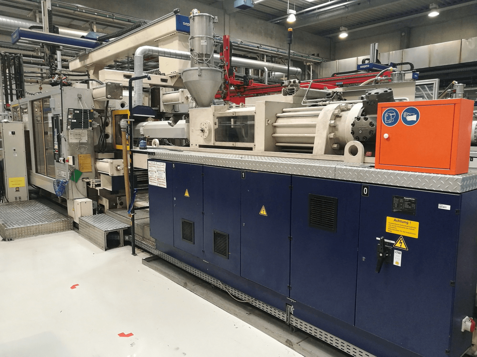 Front view of Krauss Maffei 800-5000 MC machine