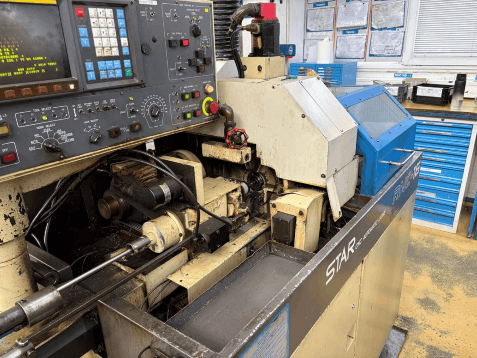 Star RNC-16B Swiss Type Turning Machine, front view showcasing control panel and internal mechanisms.