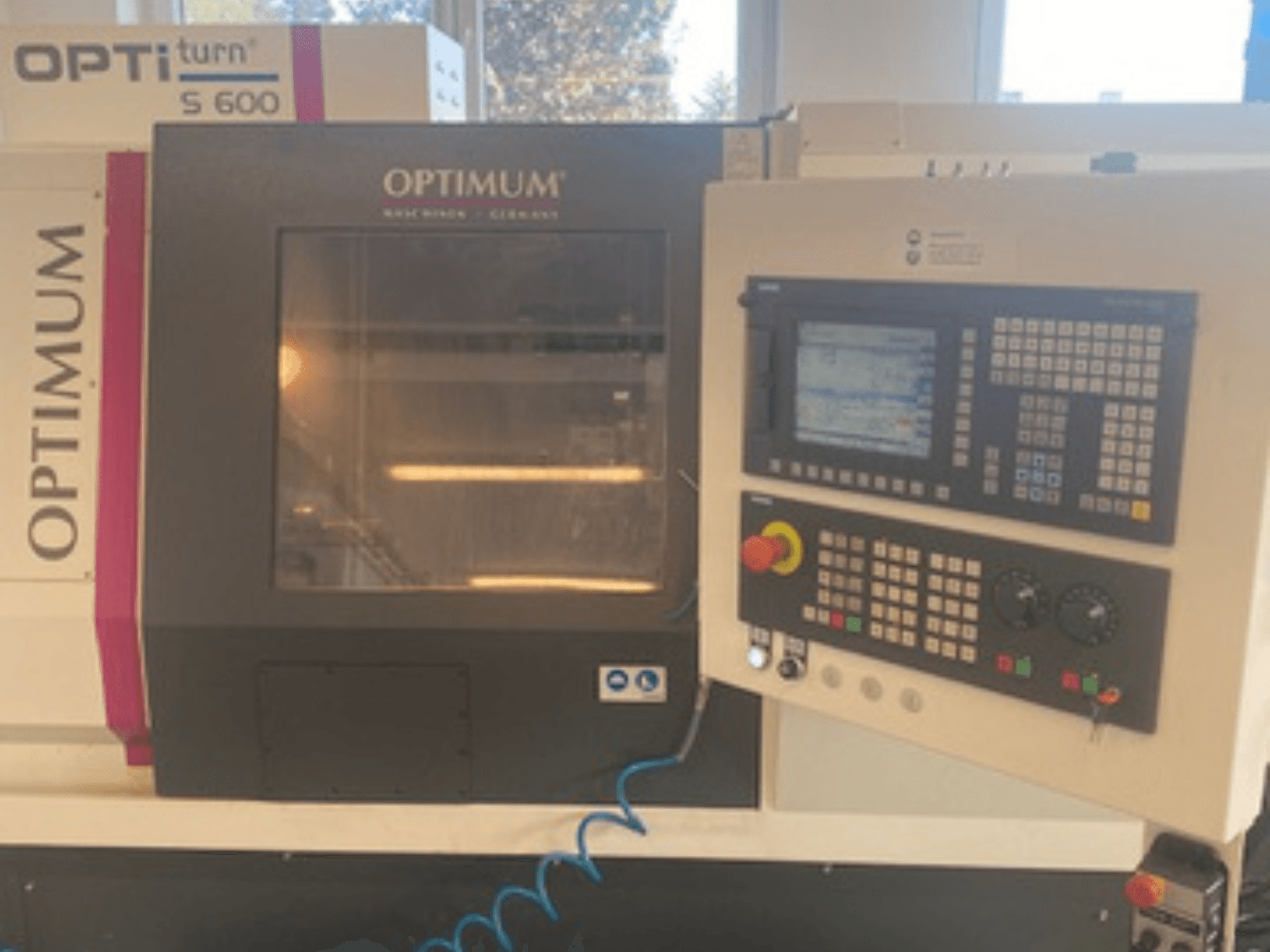 Optimum OPTIturn S 600 horizontal turning machine, front view showcasing control panel and display.