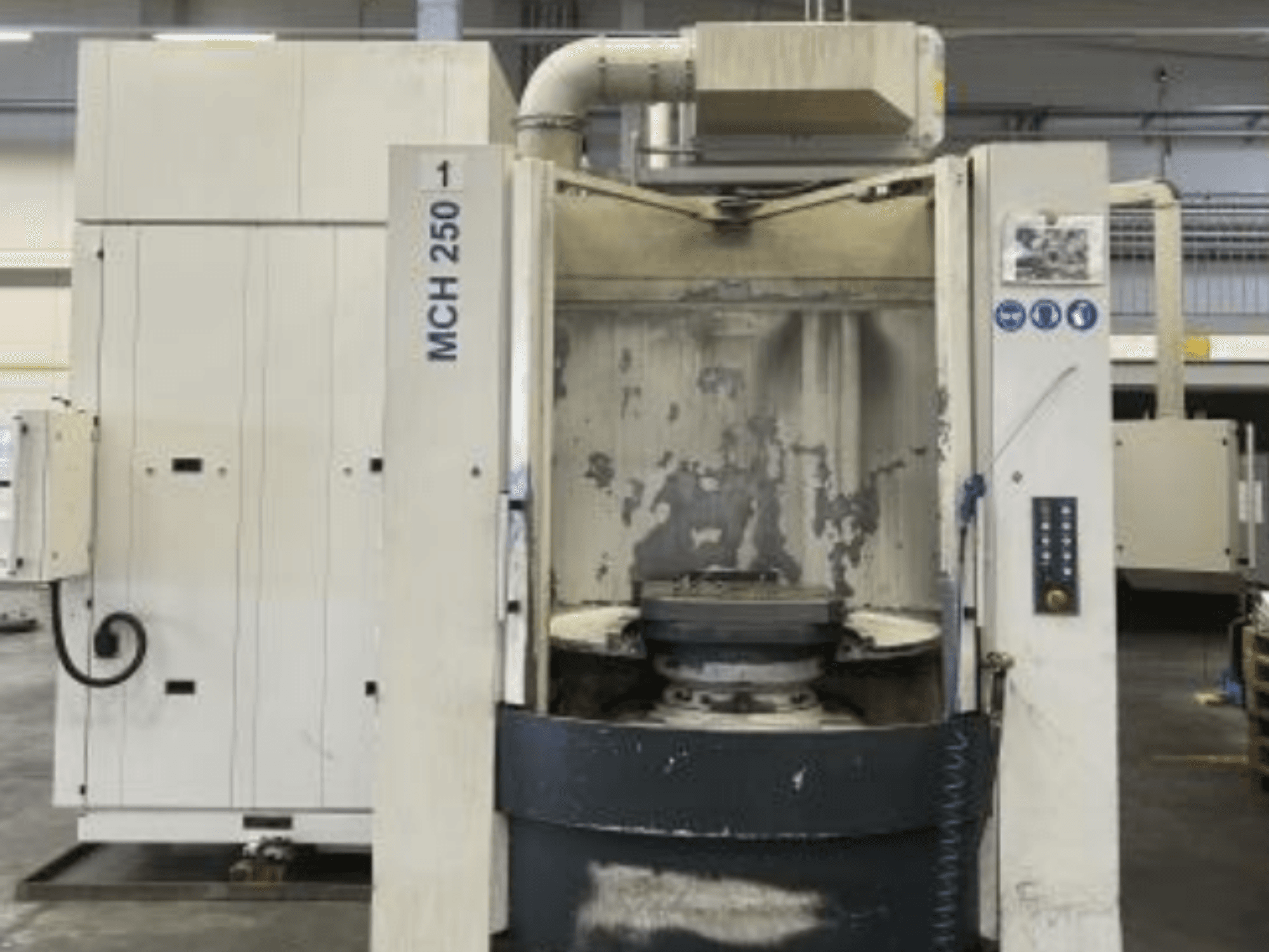 Vertical front view of HELLER MCH 250 horizontal machining centre showing control panel and main spindle area.