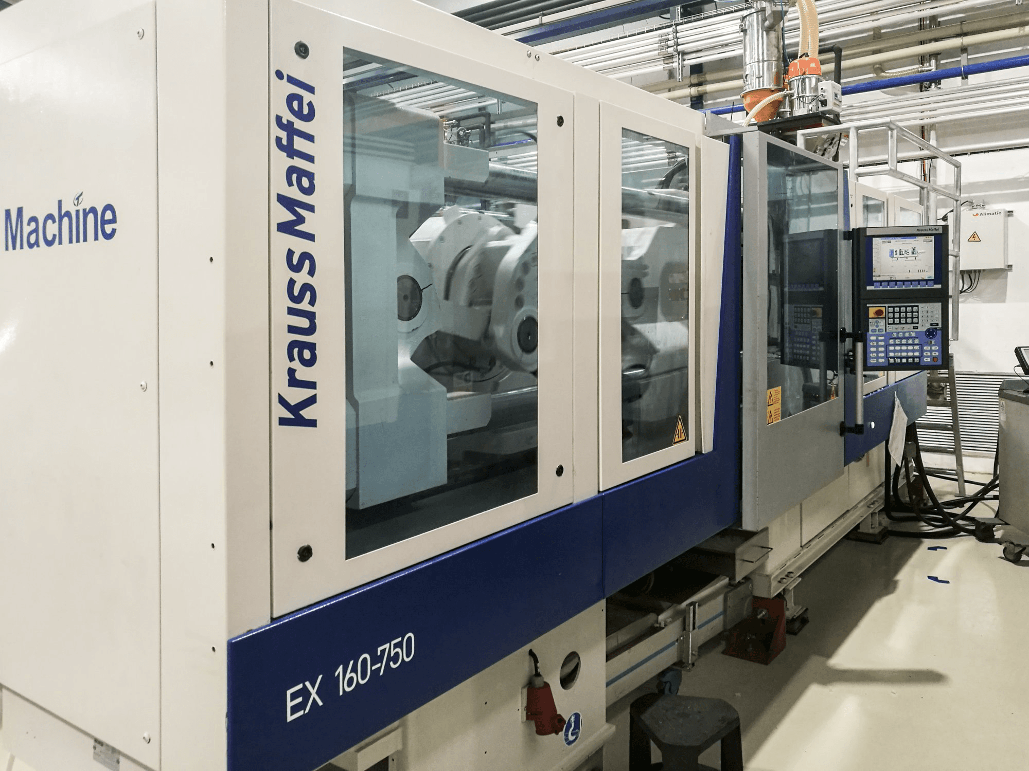 Left view of Krauss Maffei 160-750 EX Machine