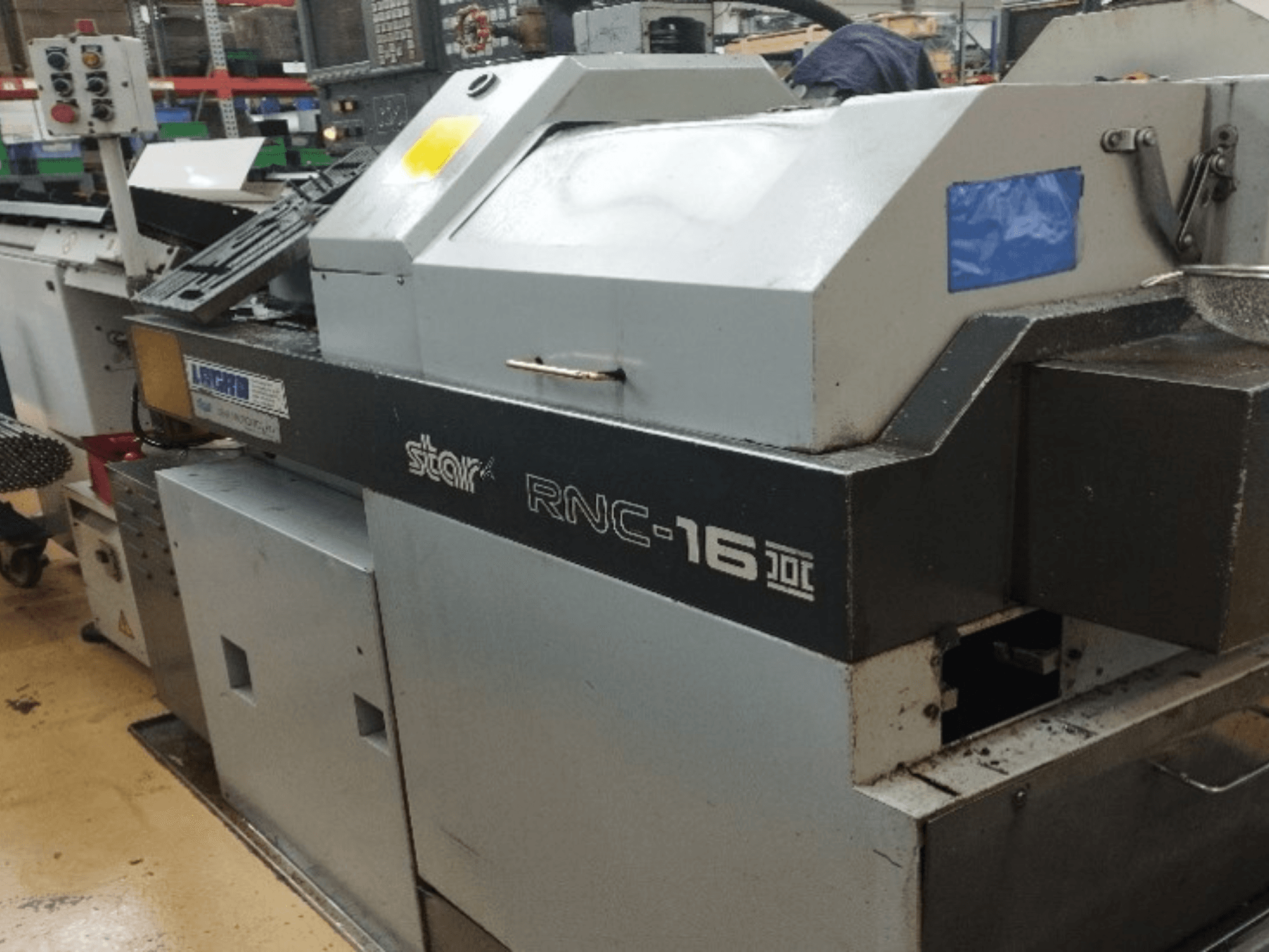 Star RNC16B-1 Swiss Type Turning Machine, front view, showcasing control panel and machine components in a workshop setting.